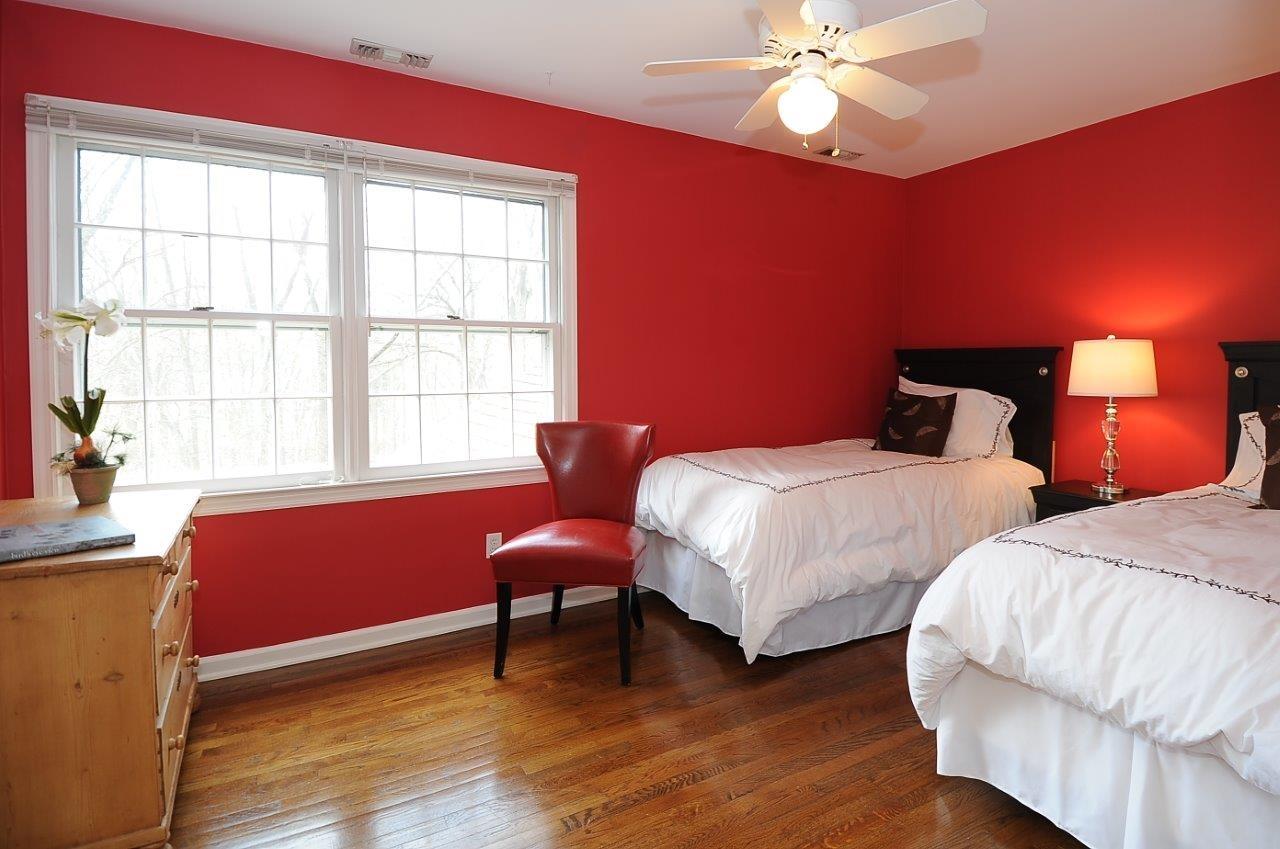 227 Marvin Ridge Road New Canaan, CT 06840 - Photo 21 of 34 a bedroom with two beds and a window
