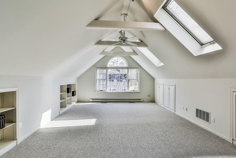 227 Marvin Ridge Road New Canaan, CT 06840 - Photo 23 of 34 an empty room with windows and fan