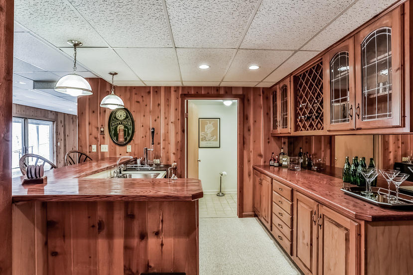227 Marvin Ridge Road New Canaan, CT 06840 - Photo 26 of 34 a kitchen that has a lot of cabinets and wooden floor