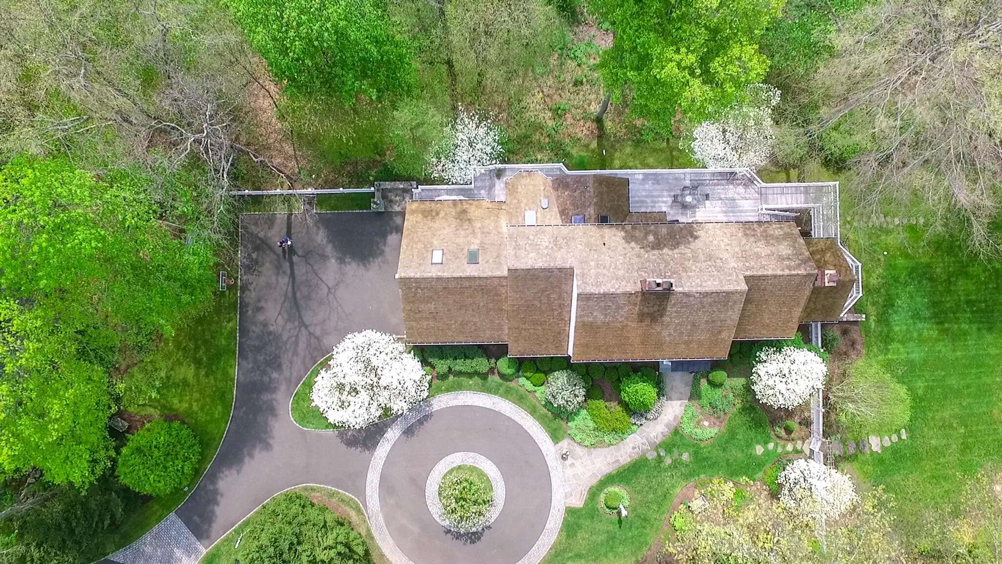 227 Marvin Ridge Road New Canaan, CT 06840 - Photo 32 of 34 an aerial view of a house with a yard and large trees