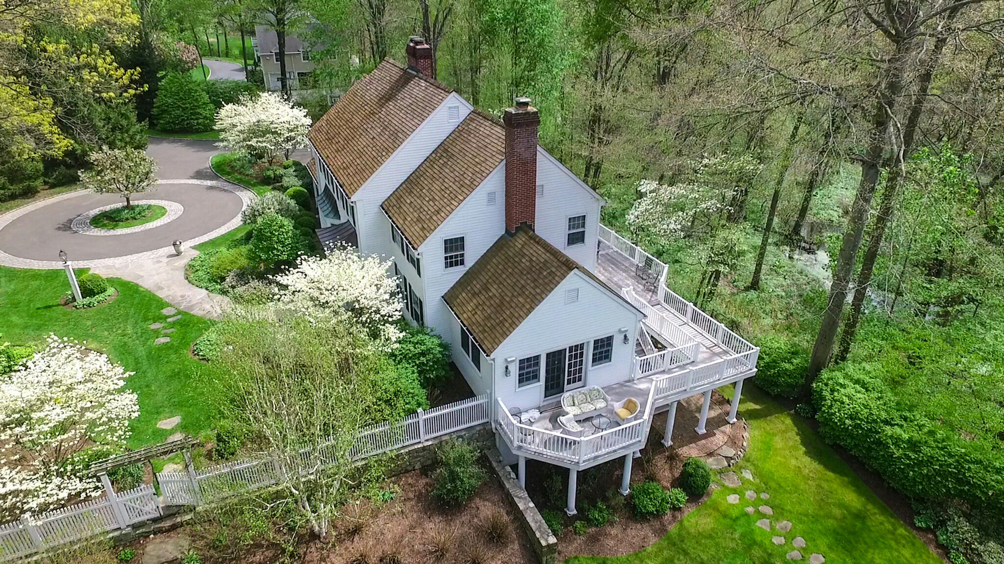 227 Marvin Ridge Road New Canaan, CT 06840 - Photo 33 of 34 a view of a house with backyard and sitting area