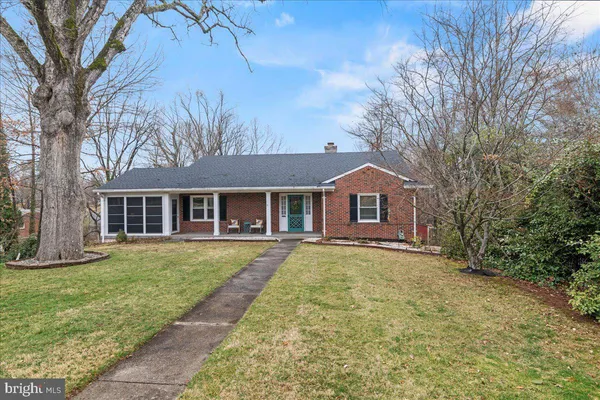 a front view of a house with yard