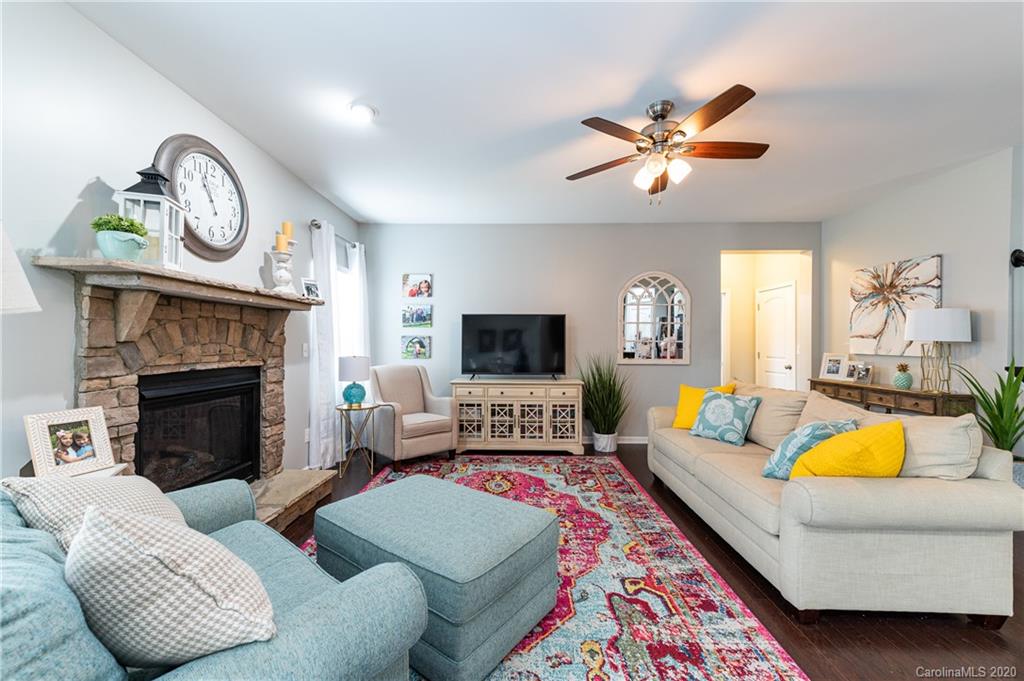 79362 Ridgehaven Road Lancaster, SC 29720 - Photo 14 of 37 a living room with furniture fireplace and a flat screen tv