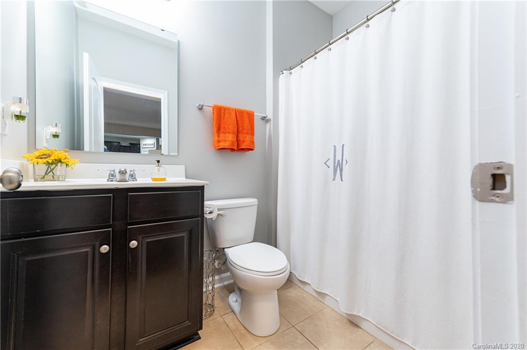 79362 Ridgehaven Road Lancaster, SC 29720 - Photo 18 of 37 a bathroom with a sink toilet and shower
