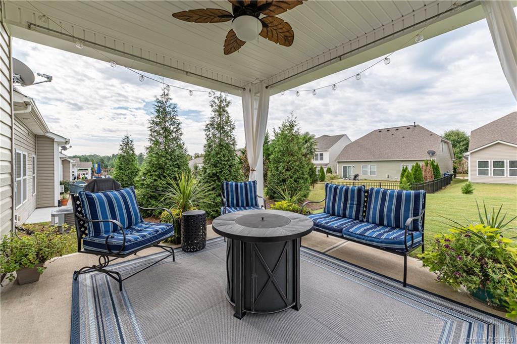 79362 Ridgehaven Road Lancaster, SC 29720 - Photo 32 of 37 a view of a patio with couches table and chairs
