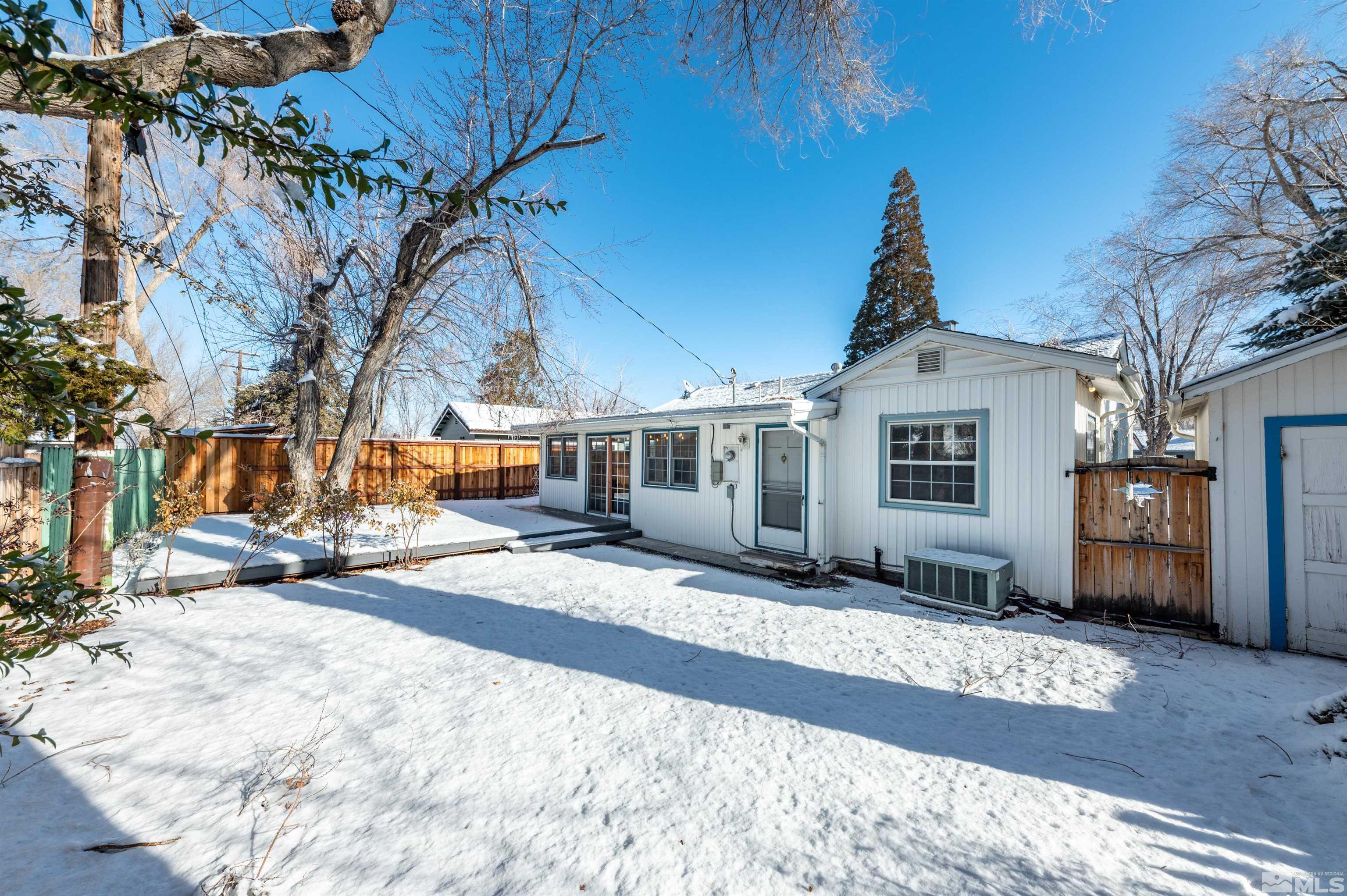 997 Meadow Street Reno, NV 89509 - Photo 33 of 33 a view of a house with snow on the road