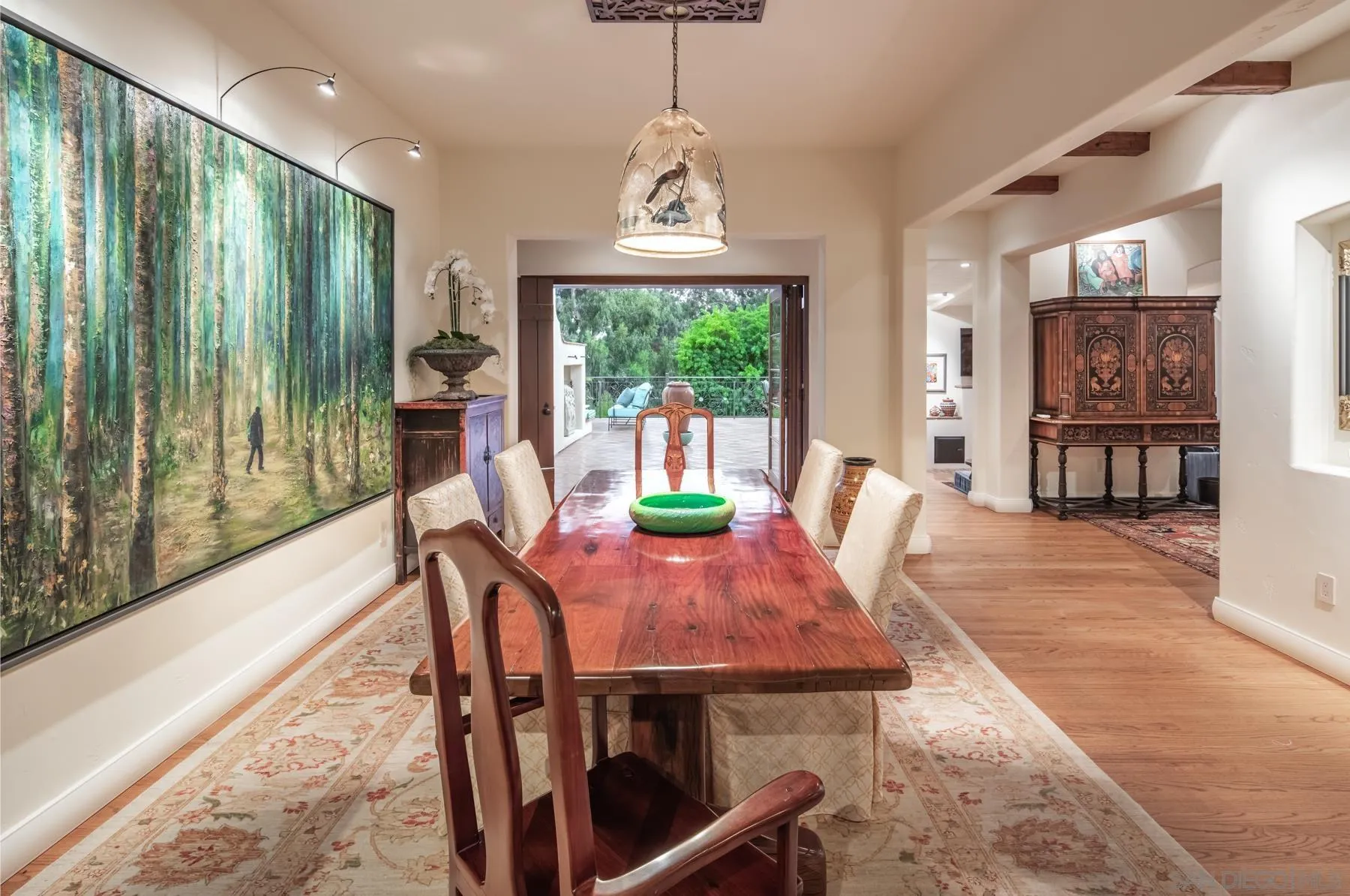 545 Rimini Road Del Mar, CA 92014 - Photo 11 of 34 a view of a dining room with furniture window and outside view