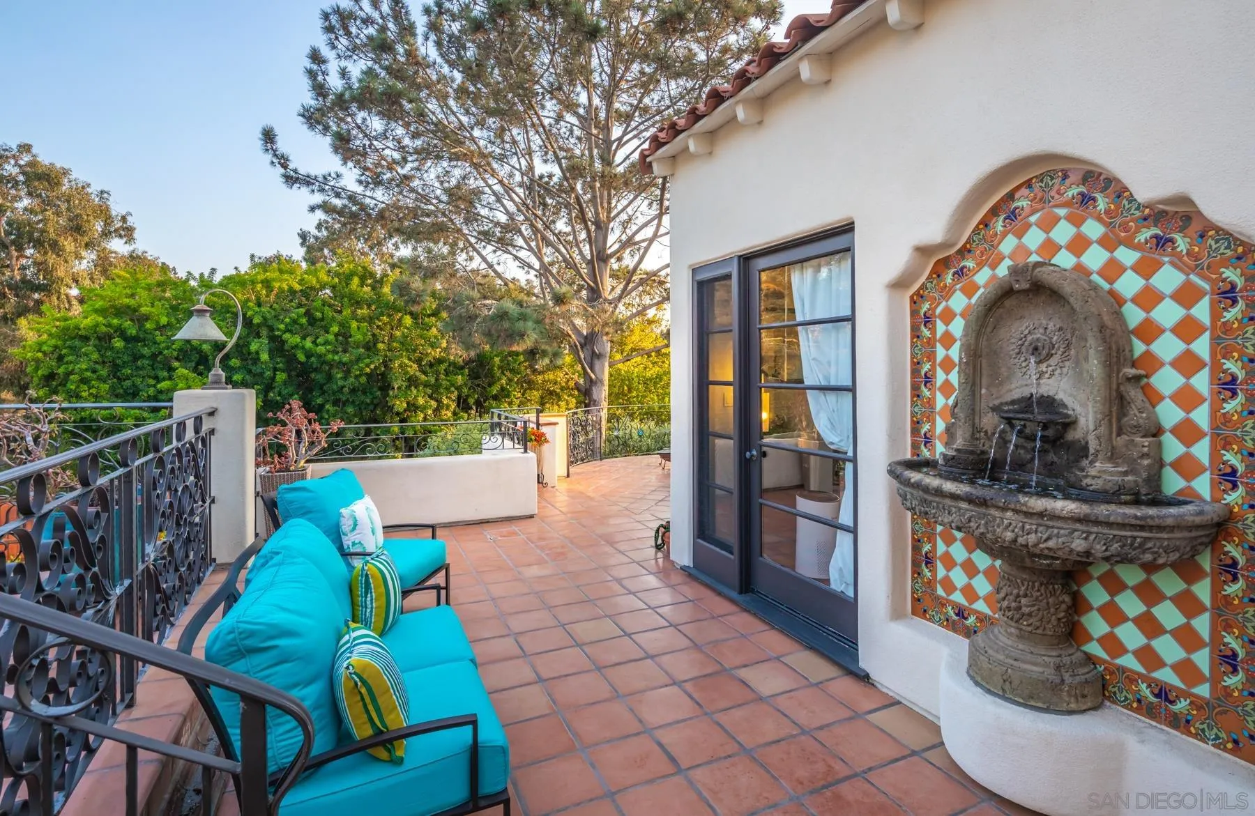 545 Rimini Road Del Mar, CA 92014 - Photo 18 of 34 a view of a porch with furniture and garden