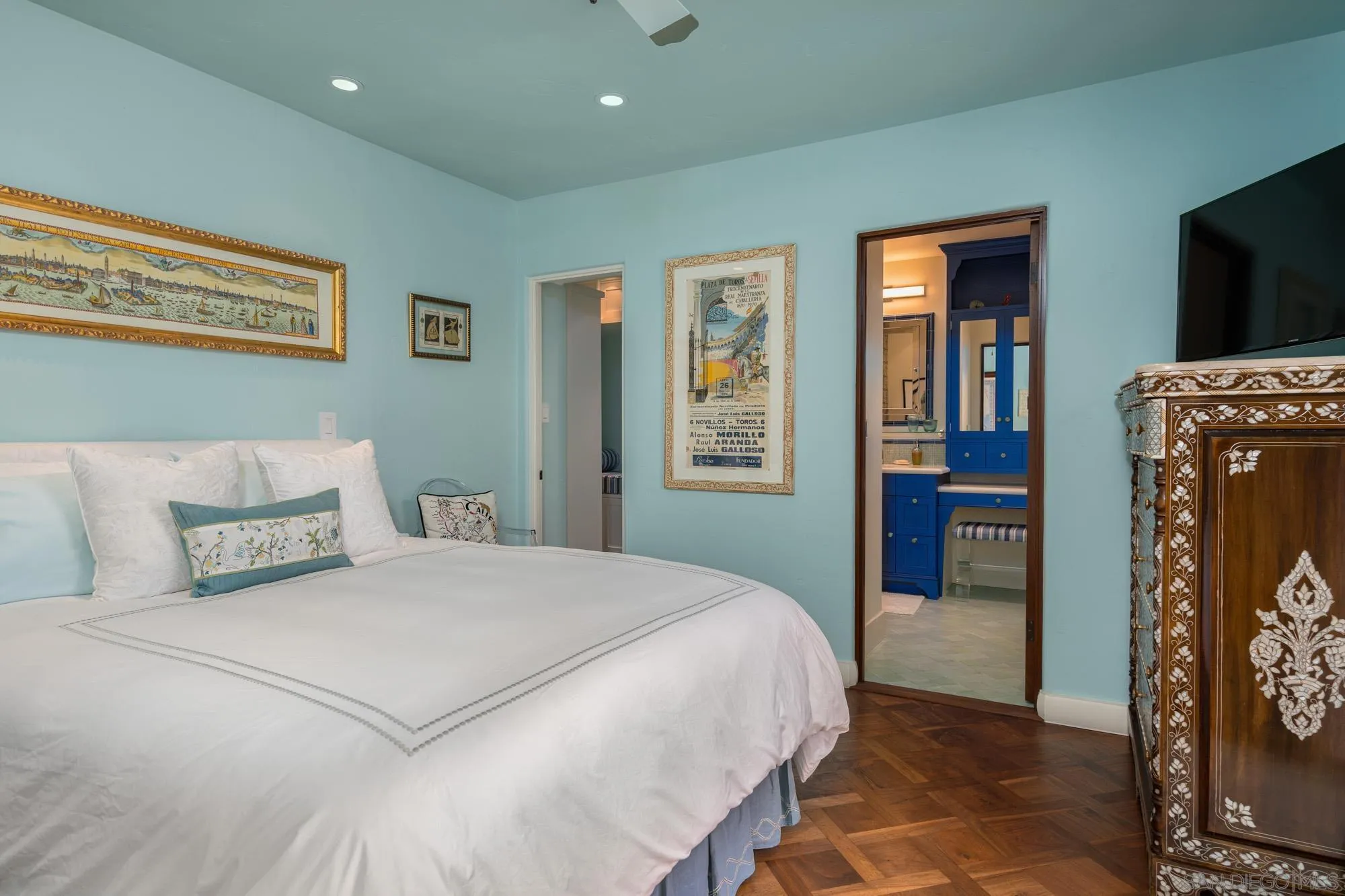 545 Rimini Road Del Mar, CA 92014 - Photo 22 of 34 a bedroom with a bed and a television