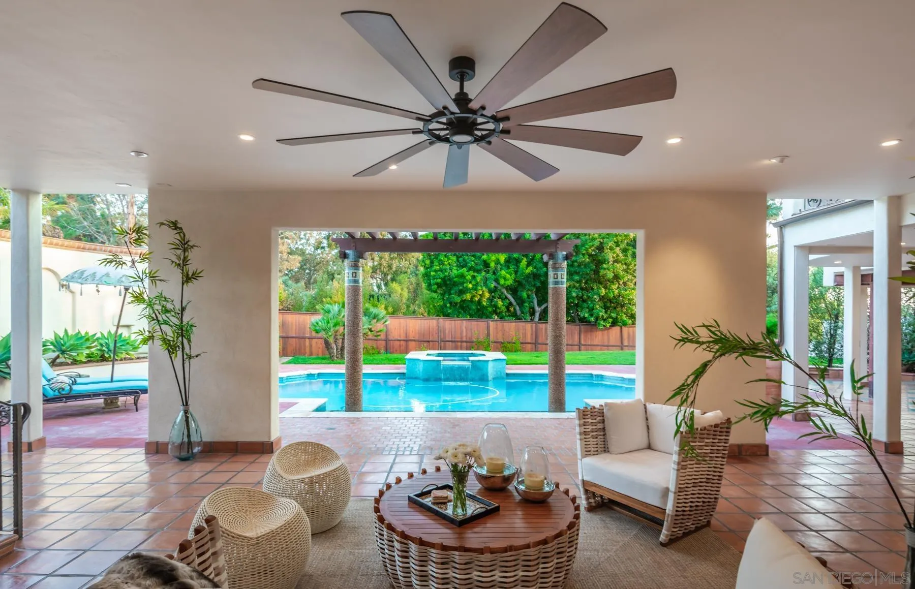 545 Rimini Road Del Mar, CA 92014 - Photo 23 of 34 a living room with furniture and a large window