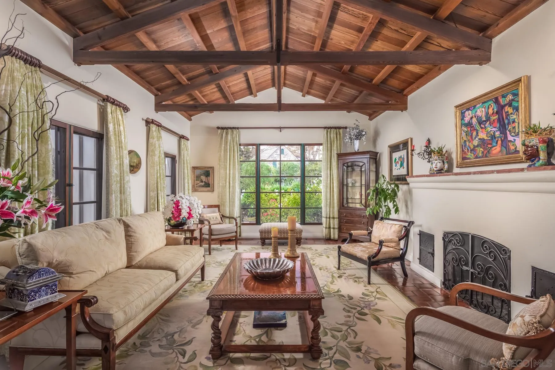 545 Rimini Road Del Mar, CA 92014 - Photo 7 of 34 a living room with furniture and a chandelier