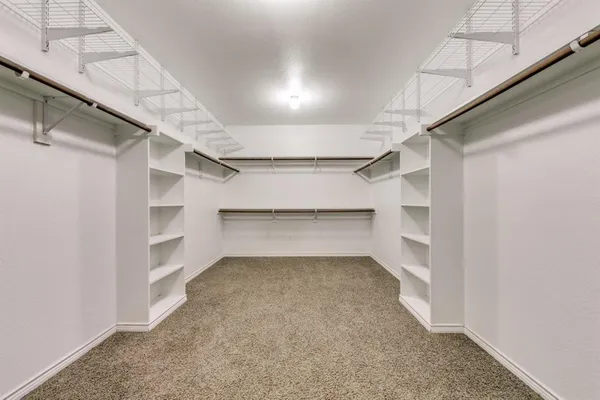 a view of a room with shelves
