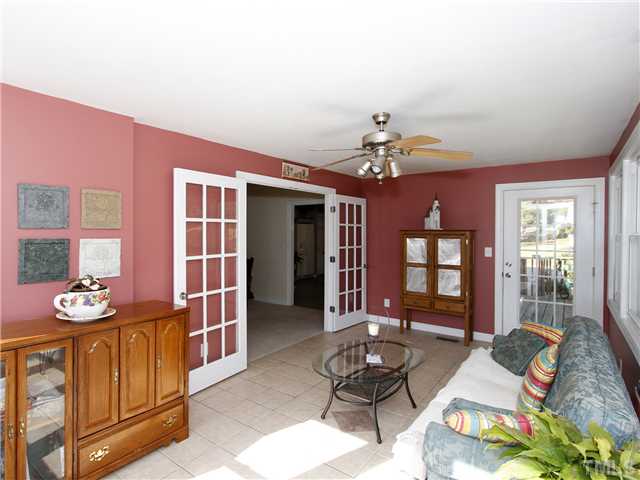 3521 Catlett Farm Road Wake Forest, NC 27587 - Photo 11 of 25 Another view of this beautiful suroom showing access to deck and double french doors.