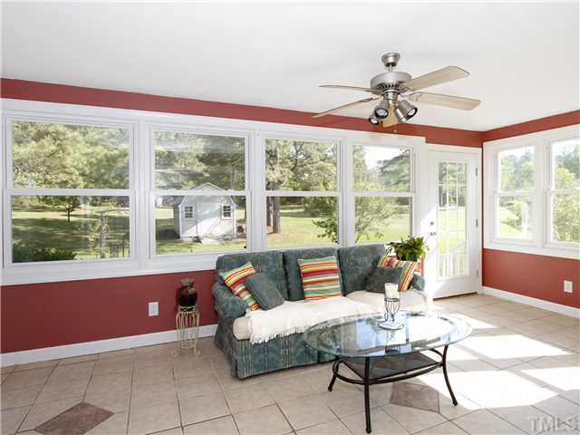 3521 Catlett Farm Road Wake Forest, NC 27587 - Photo 3 of 25 Huge suinroom overlooks private backyard and koi pond.