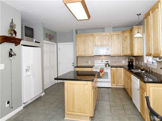 3521 Catlett Farm Road Wake Forest, NC 27587 - Photo 5 of 25 TV nook/extra storage above refrigerator space.