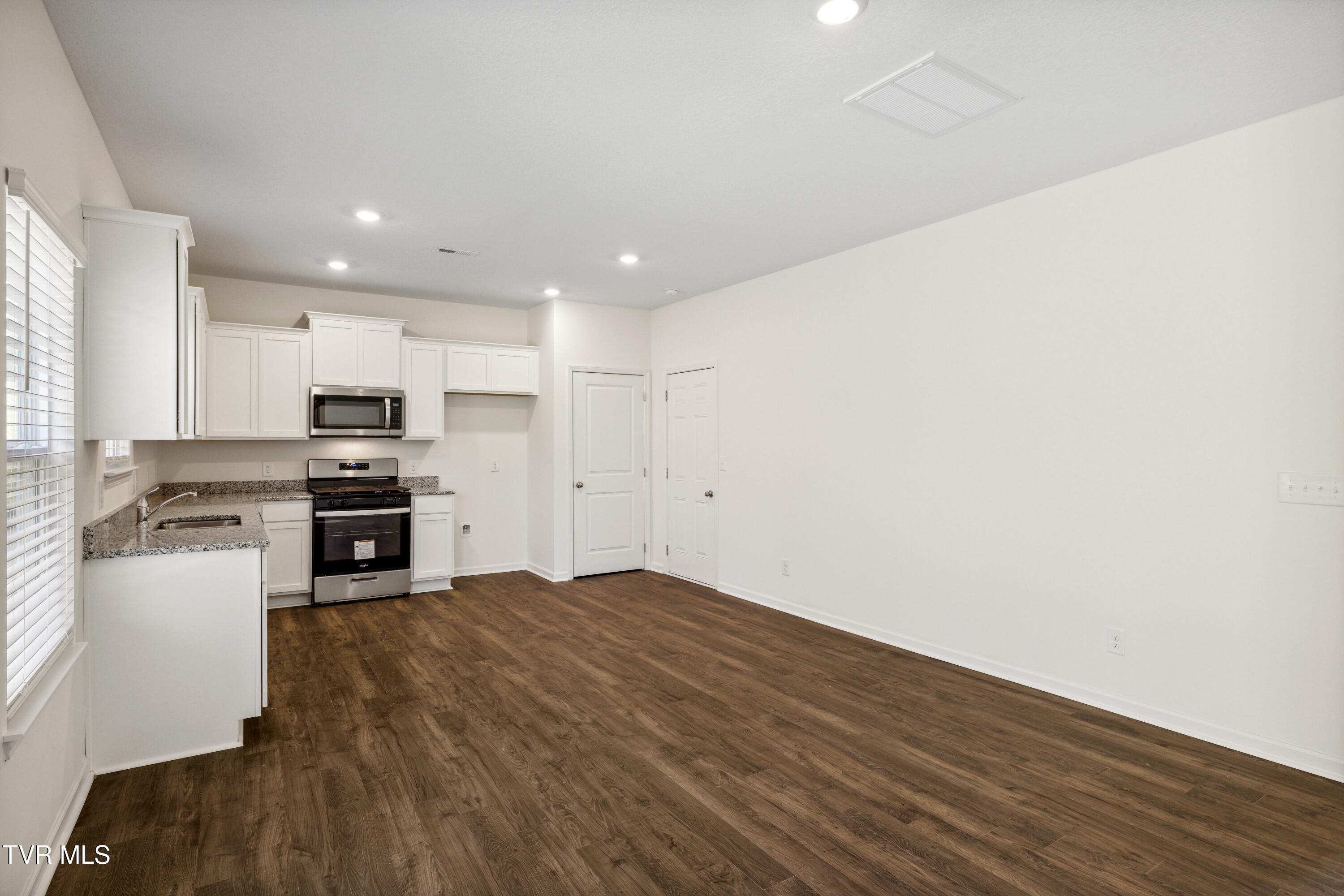 1080 Edison Road Johnson City, TN 37615 - Photo 8 of 26 Living Room + Kitchen Unfurnished