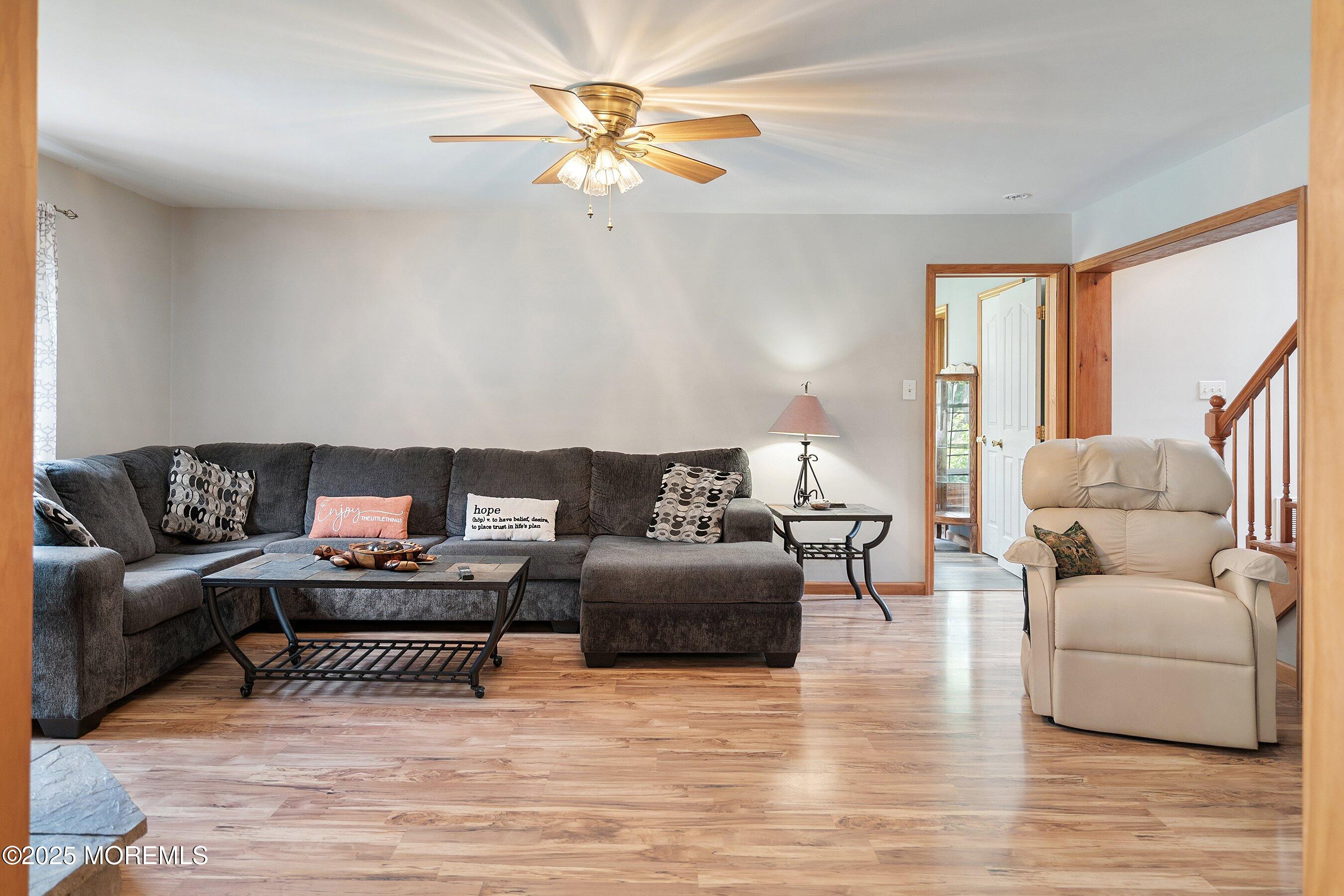 10 Hillside Avenue Tuckerton, NJ 08087 - Photo 17 of 46 a living room with furniture and a wooden floor