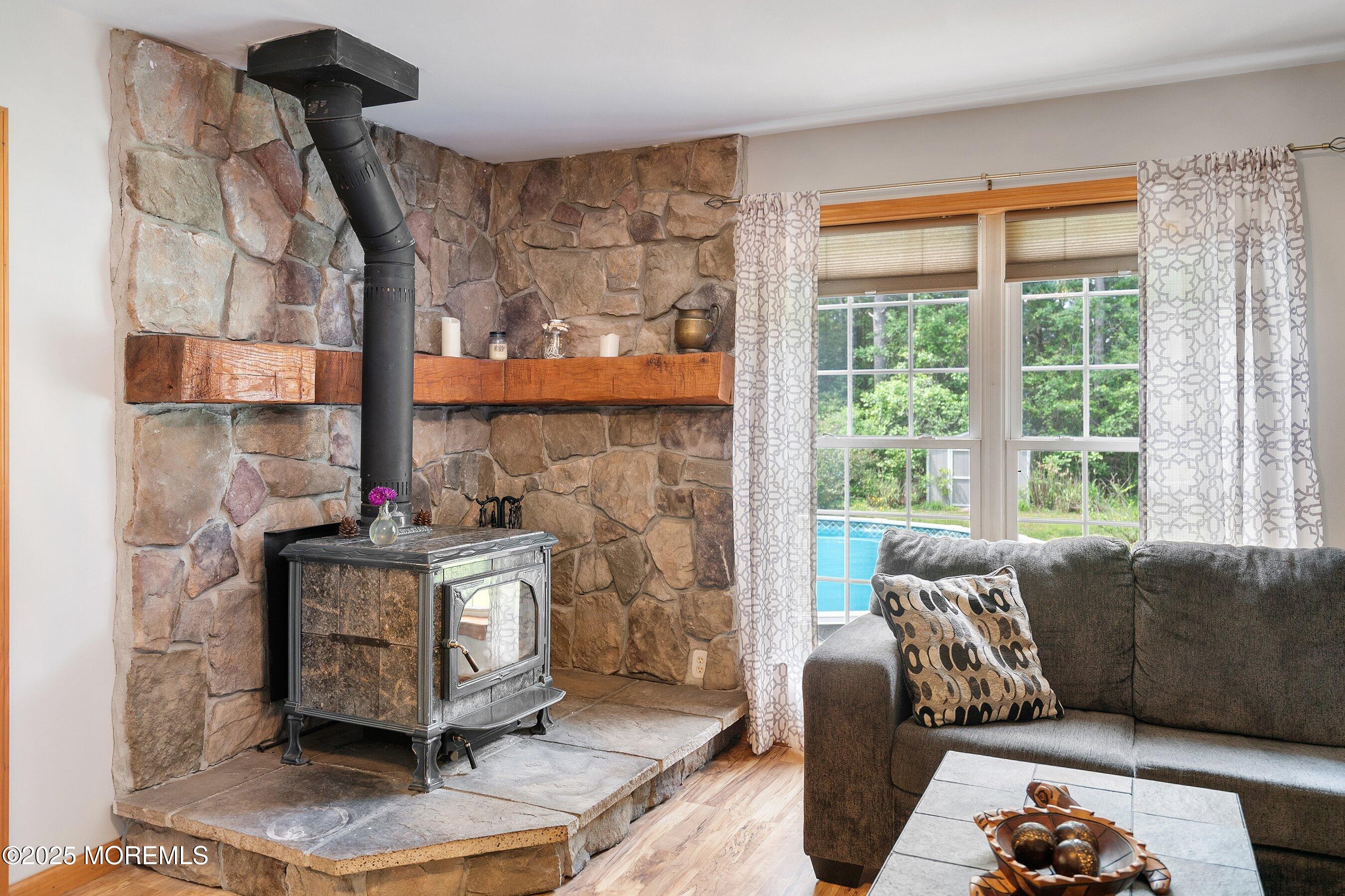 10 Hillside Avenue Tuckerton, NJ 08087 - Photo 19 of 46 a living room with furniture and a fireplace
