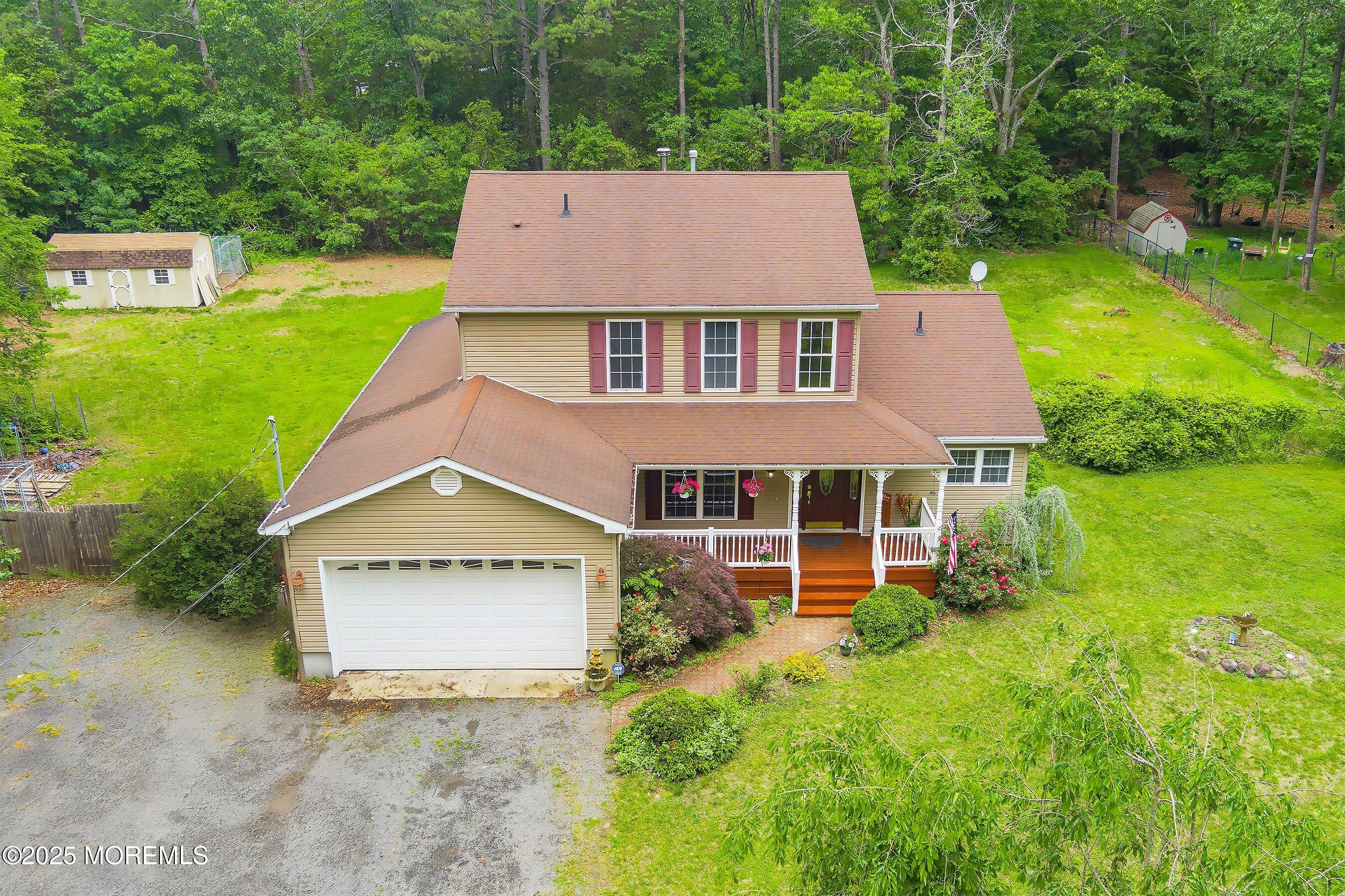 10 Hillside Avenue Tuckerton, NJ 08087 - Photo 2 of 46 a view of a house with a yard and sitting area