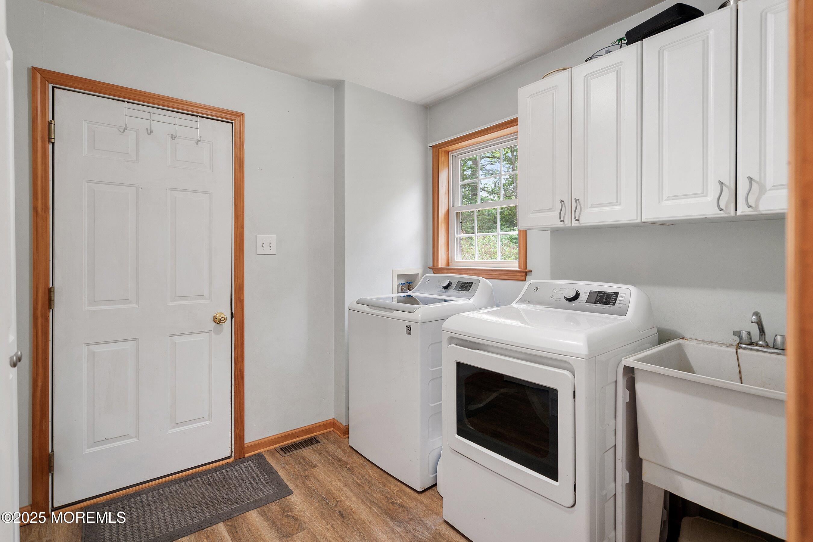 10 Hillside Avenue Tuckerton, NJ 08087 - Photo 24 of 46 a view of storage and utility room with washer and dryer