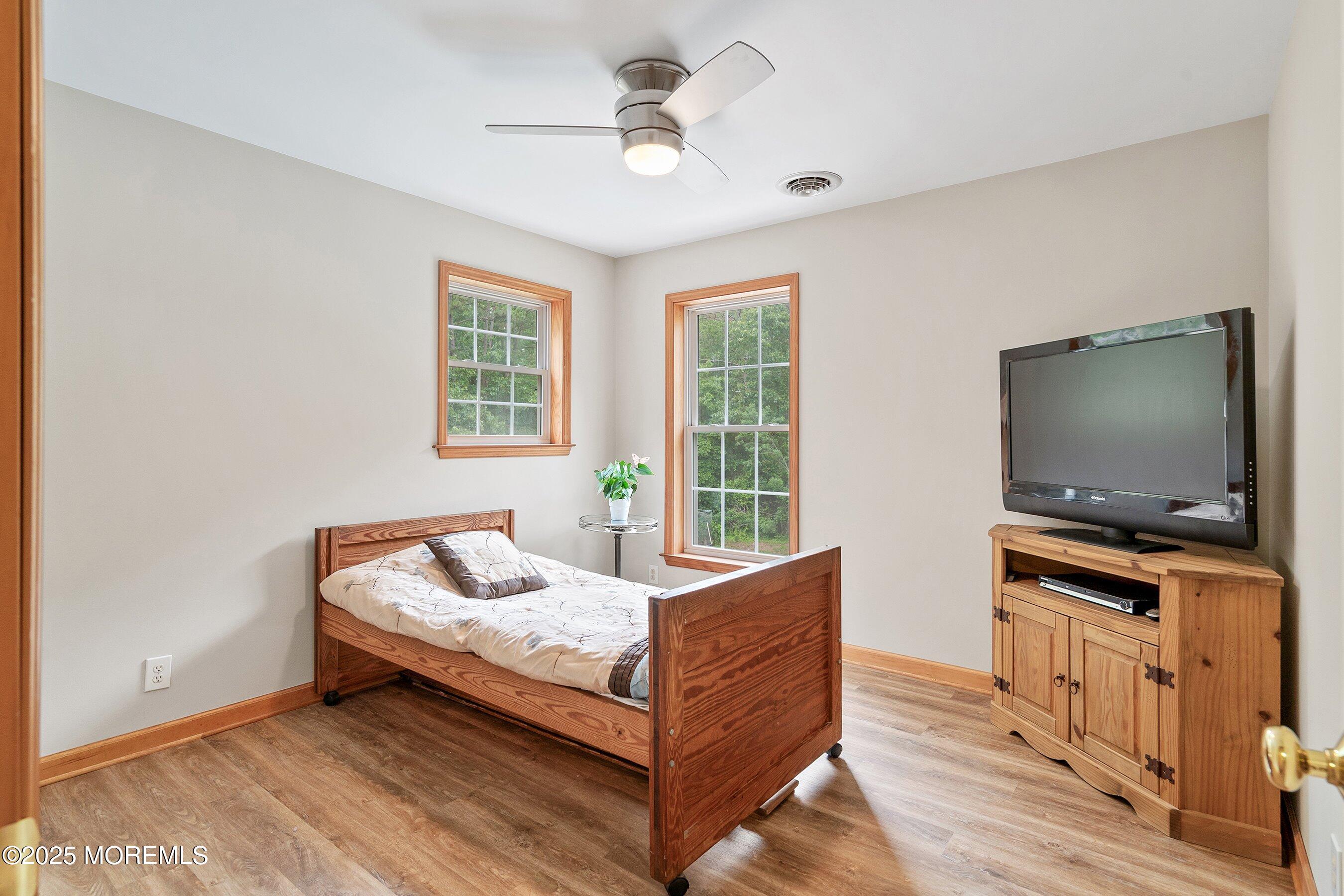 10 Hillside Avenue Tuckerton, NJ 08087 - Photo 32 of 46 a living room with furniture and a flat screen tv