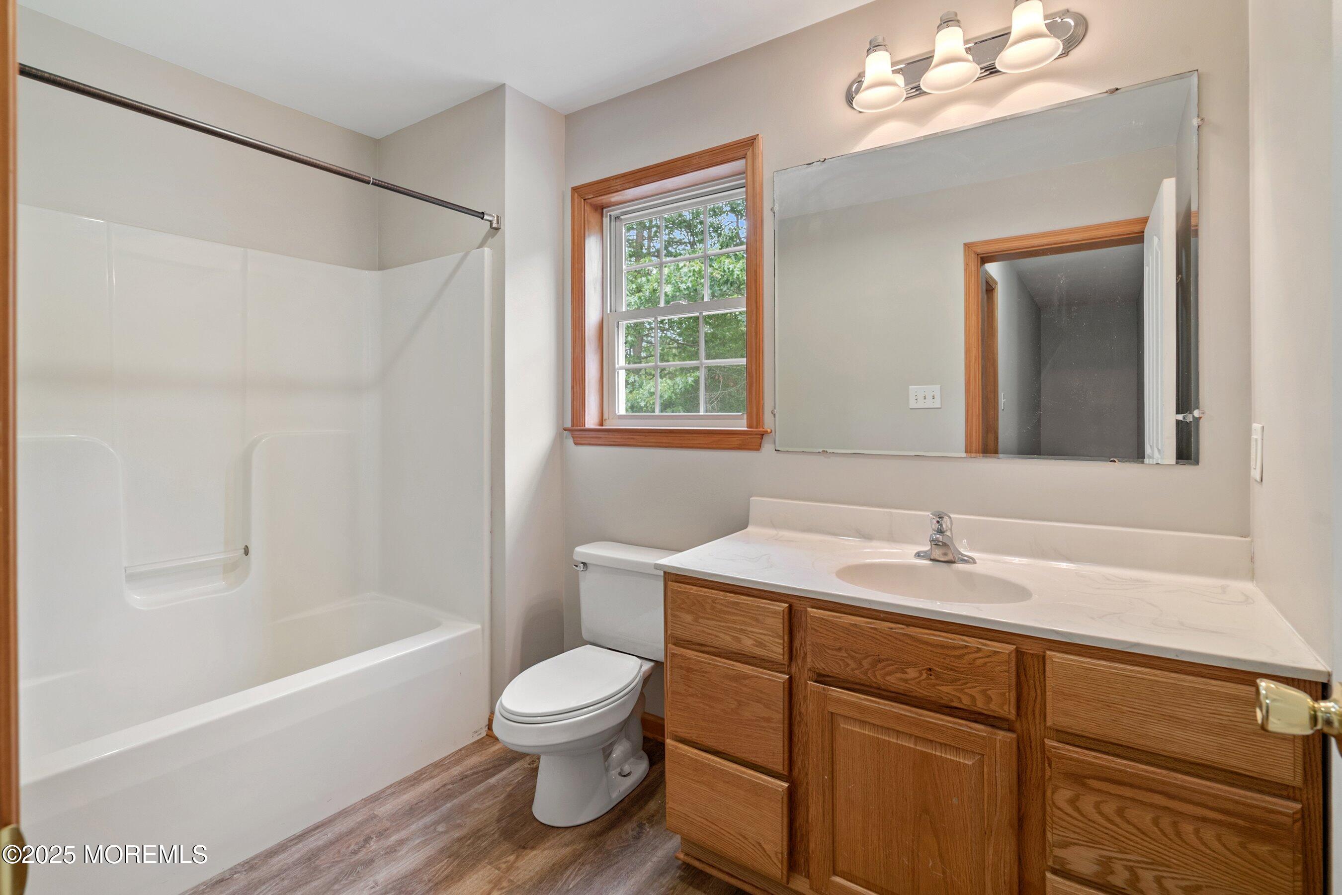 10 Hillside Avenue Tuckerton, NJ 08087 - Photo 36 of 46 a bathroom with a sink toilet tub and vanity