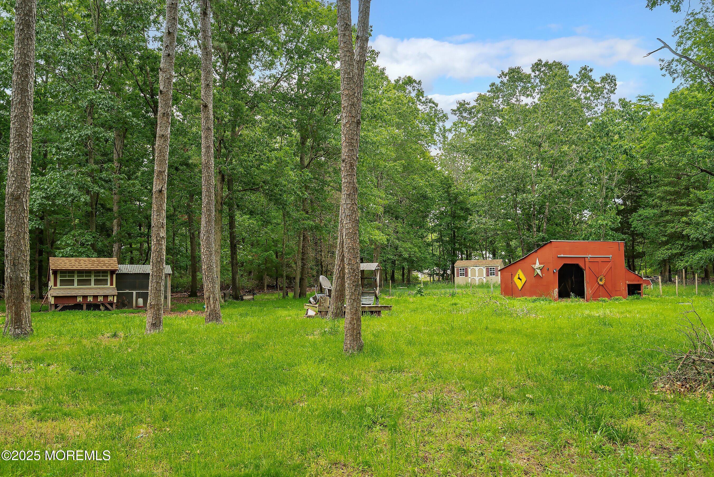 10 Hillside Avenue Tuckerton, NJ 08087 - Photo 39 of 46 a view of a house with a backyard