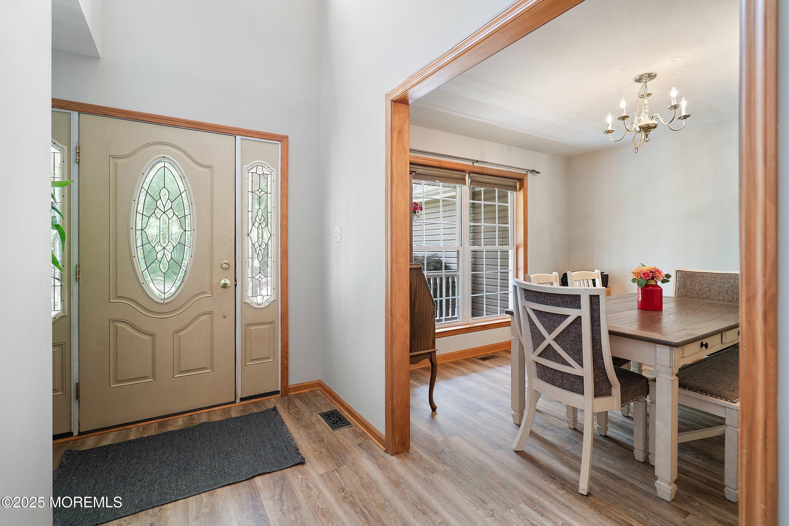 10 Hillside Avenue Tuckerton, NJ 08087 - Photo 7 of 46 a dining room with furniture a rug and wooden floor