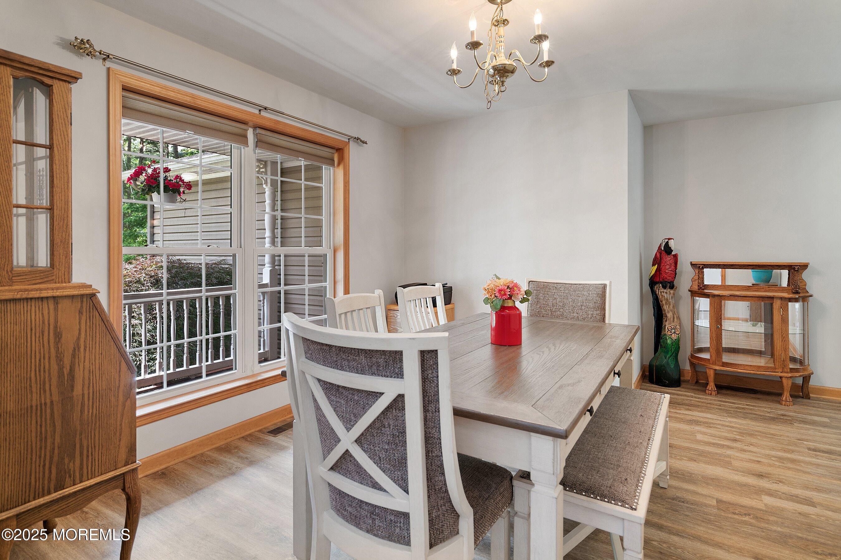 10 Hillside Avenue Tuckerton, NJ 08087 - Photo 10 of 46 a view of a dining room with furniture window and wooden floor