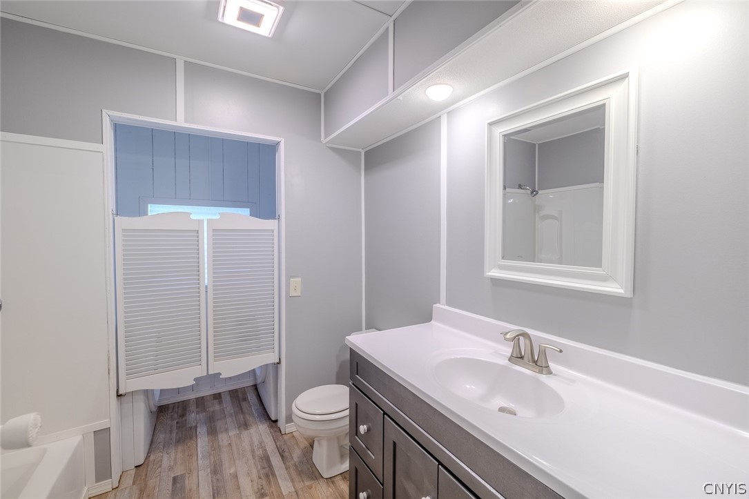 6940 Highbridge Road, Unit 1 De Witt, NY 13066 - Photo 12 of 13 Full Second bath with laundry