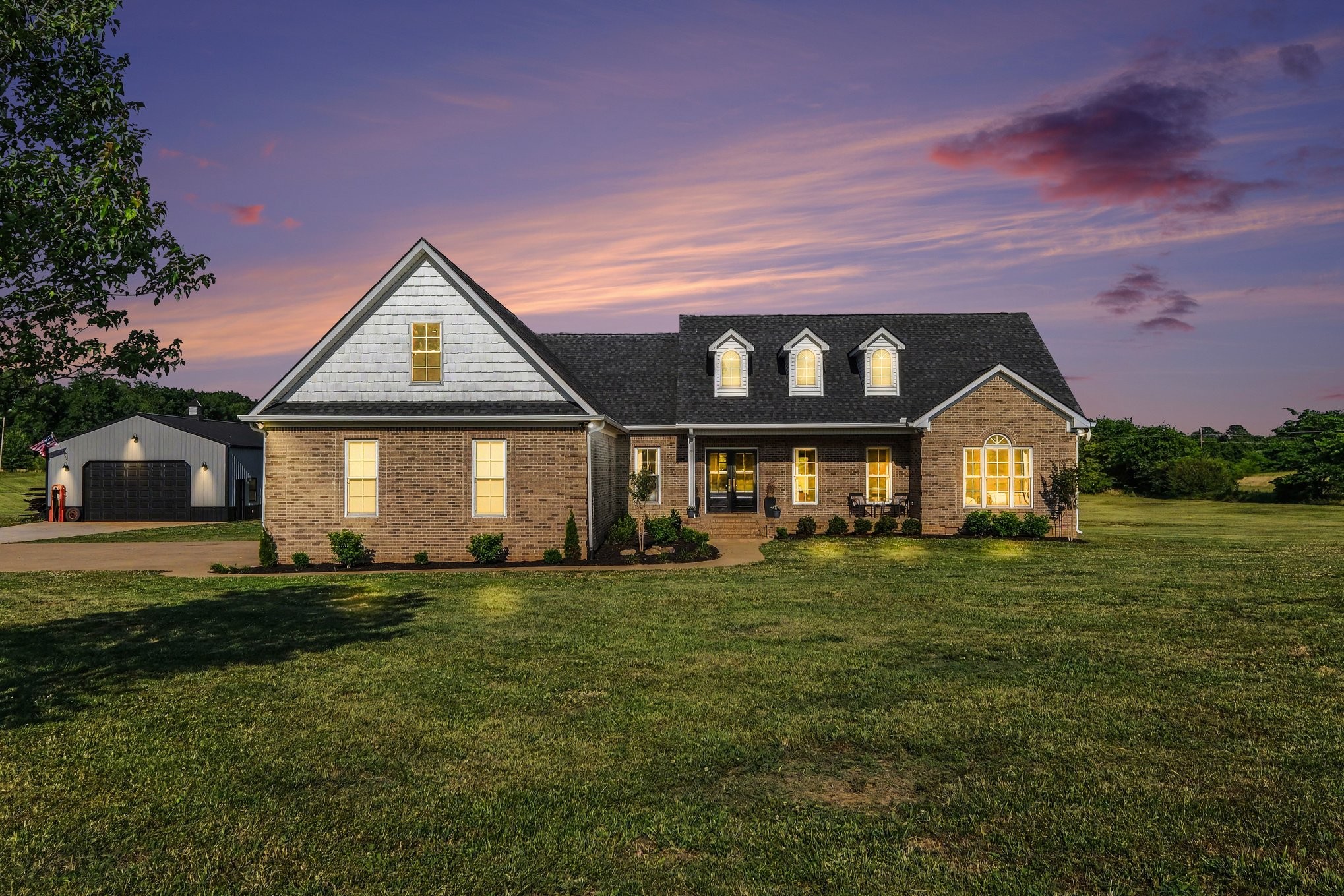 2829 Anes Station Road Lewisburg, TN 37091 - Photo 2 of 43 a front view of a house with a yard