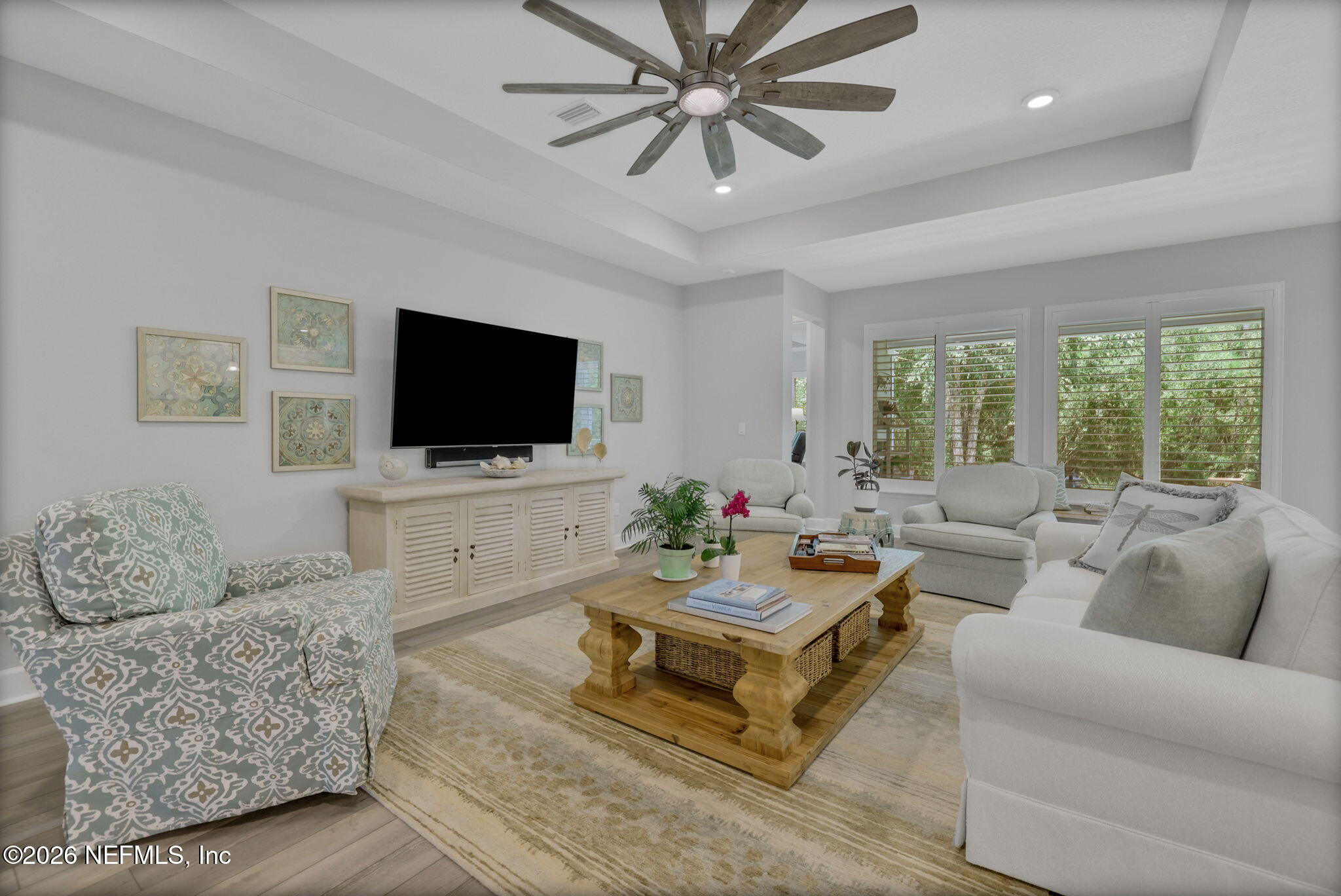 146 Clarendon Road St. Johns, FL 32259 - Photo 10 of 59 a living room with furniture and a flat screen tv
