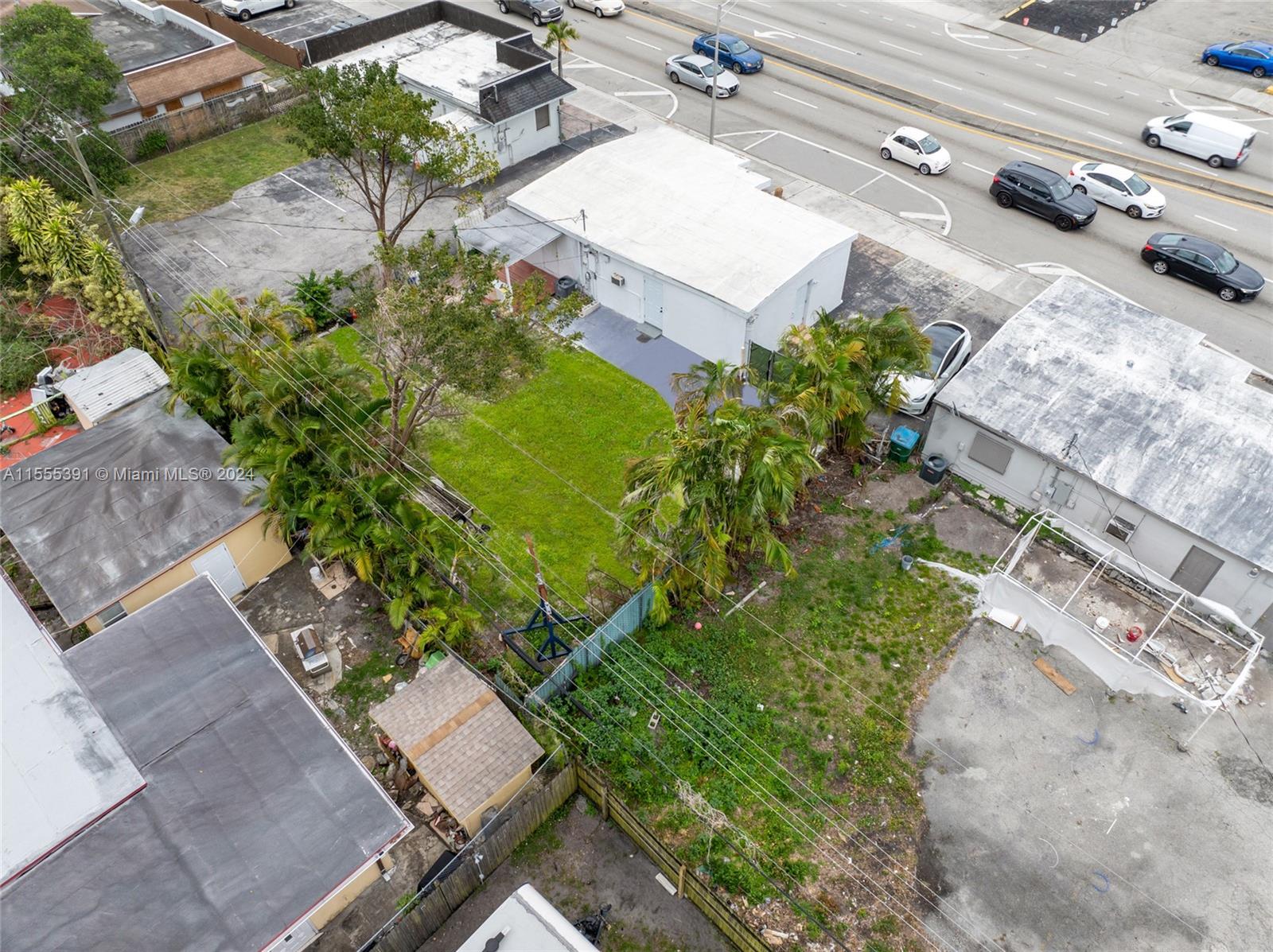 6335 Pembroke Road Hollywood, FL 33023 - Photo 12 of 29 an aerial view of a house with a yard