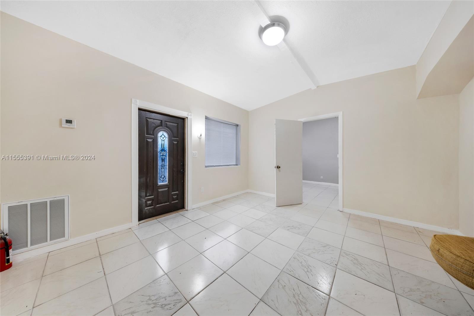 6335 Pembroke Road Hollywood, FL 33023 - Photo 25 of 29 a view of an empty room with glass door