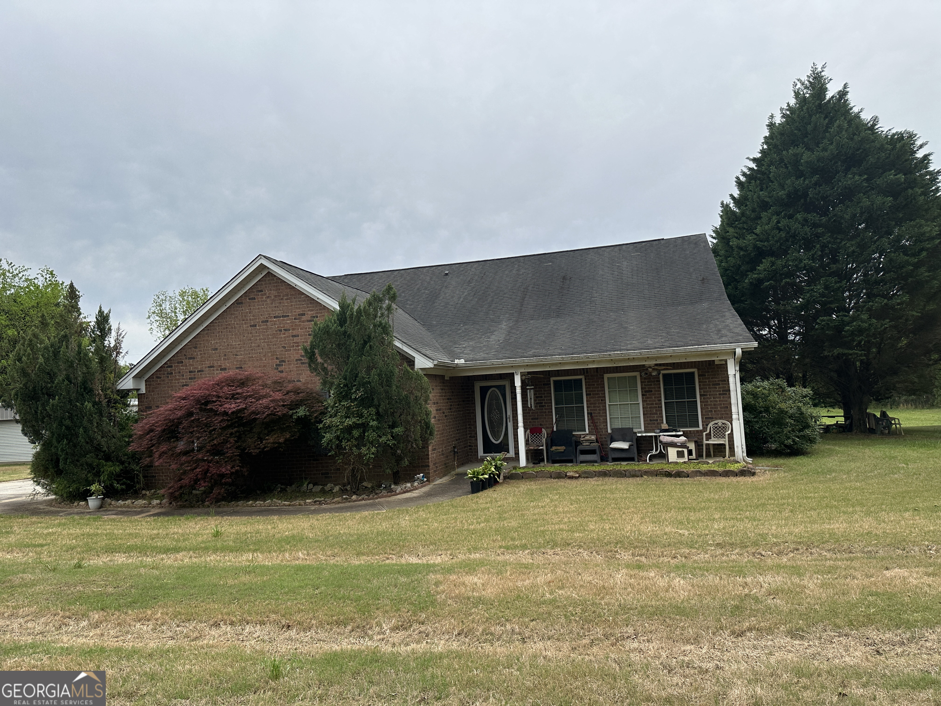 407 High Falls Road Jackson, GA 30233 - Photo 1 of 20 a house view with a garden space