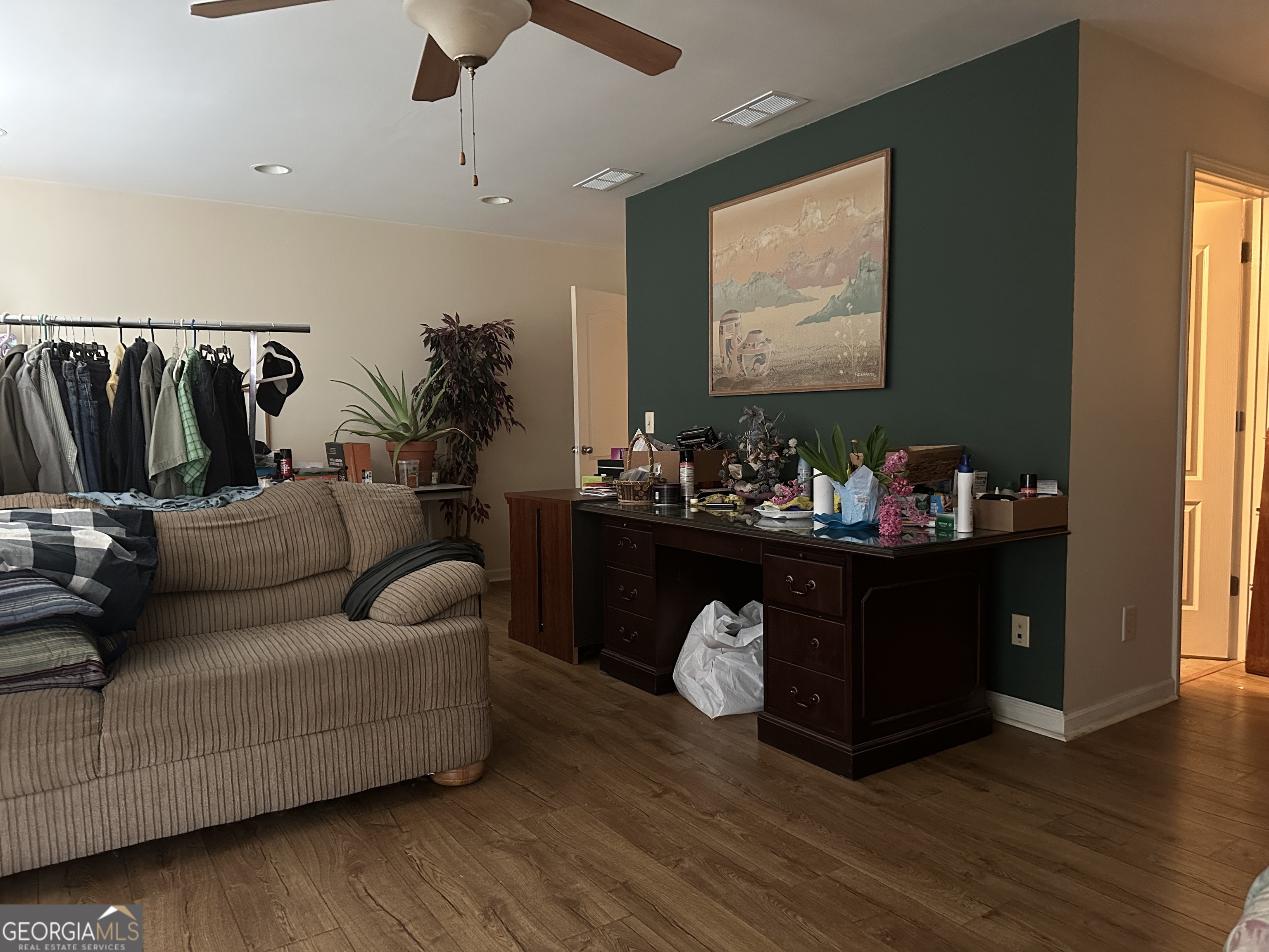 407 High Falls Road Jackson, GA 30233 - Photo 13 of 20 a living room with furniture and a flat screen tv