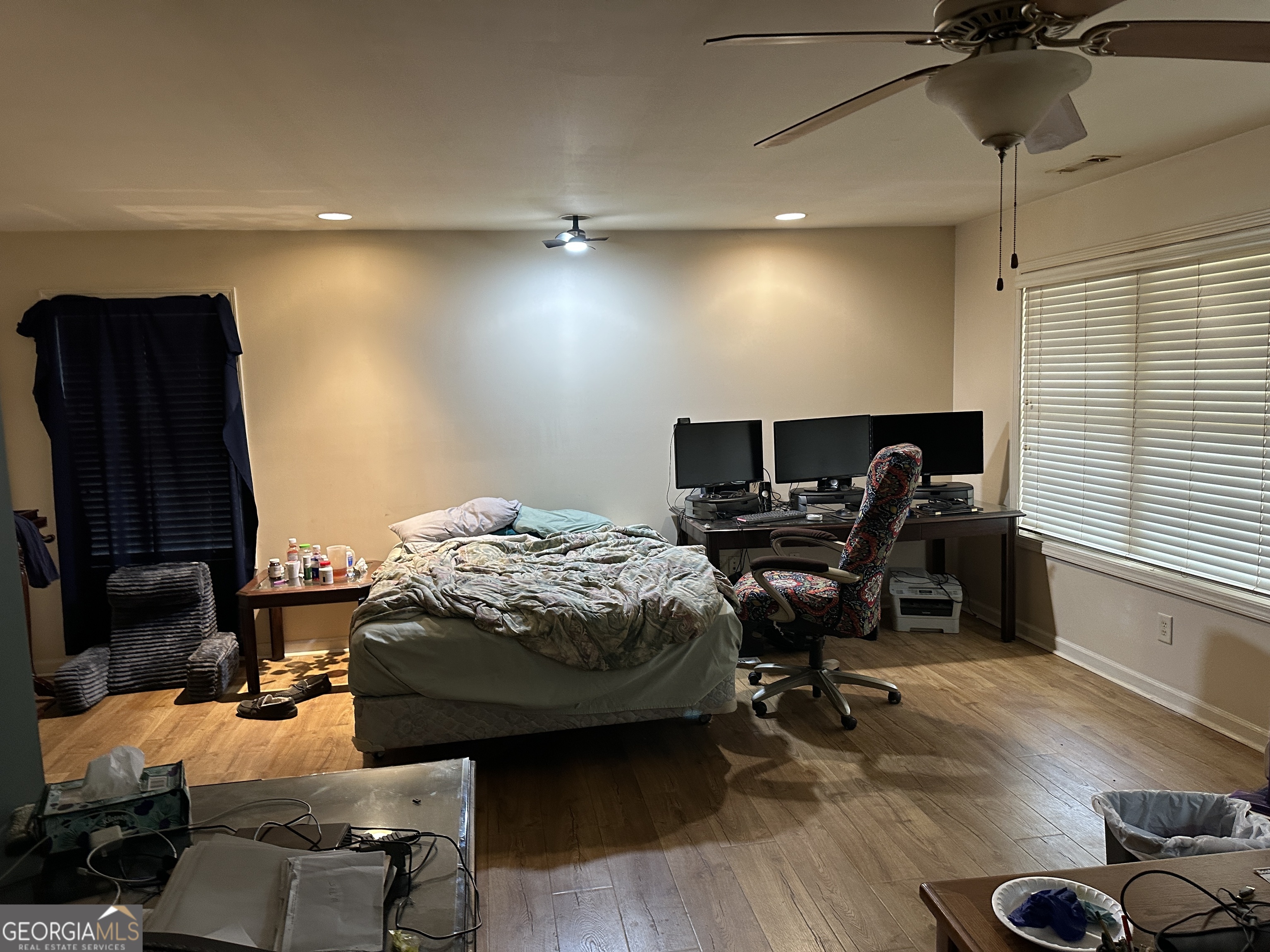 407 High Falls Road Jackson, GA 30233 - Photo 14 of 20 a bedroom that has a bed and a chair
