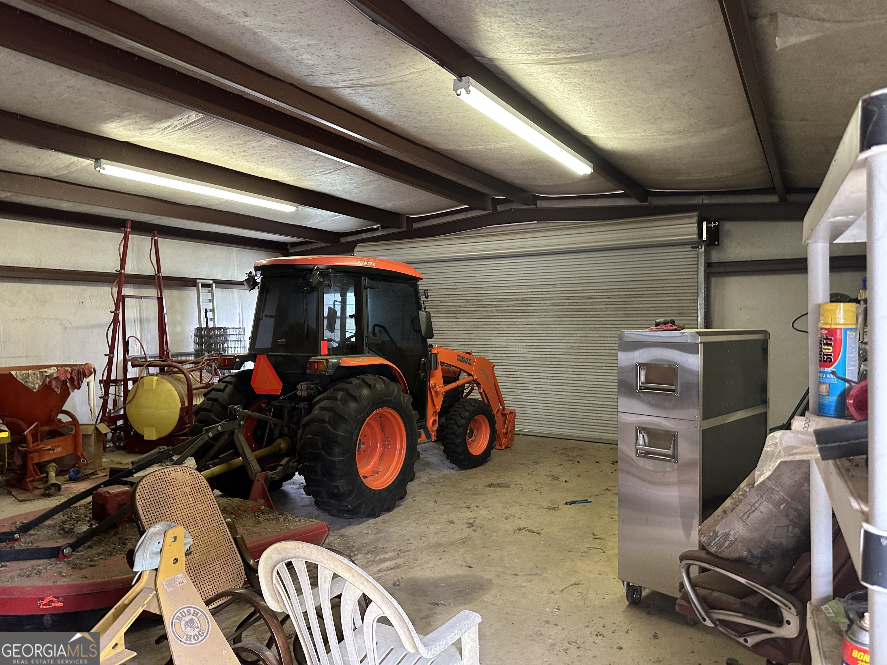 407 High Falls Road Jackson, GA 30233 - Photo 2 of 20 a view of a room with gym equipment