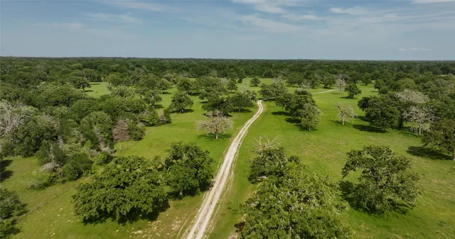 a view of a lake with a yard