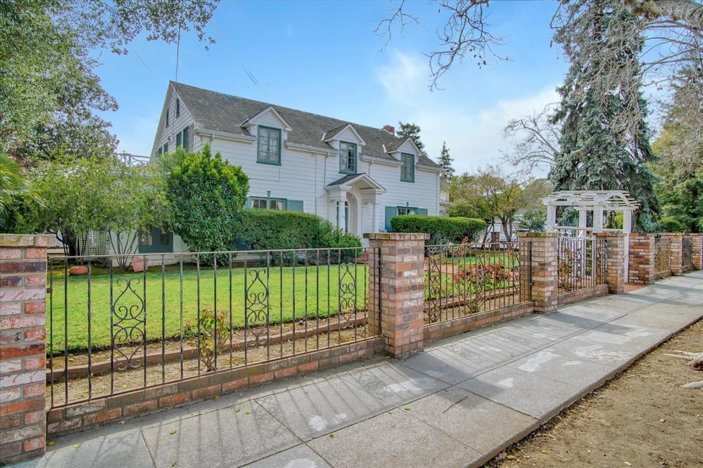 286 5th Street Gilroy, CA 95020 - Photo 2 of 47 a view of a house with a wooden fence