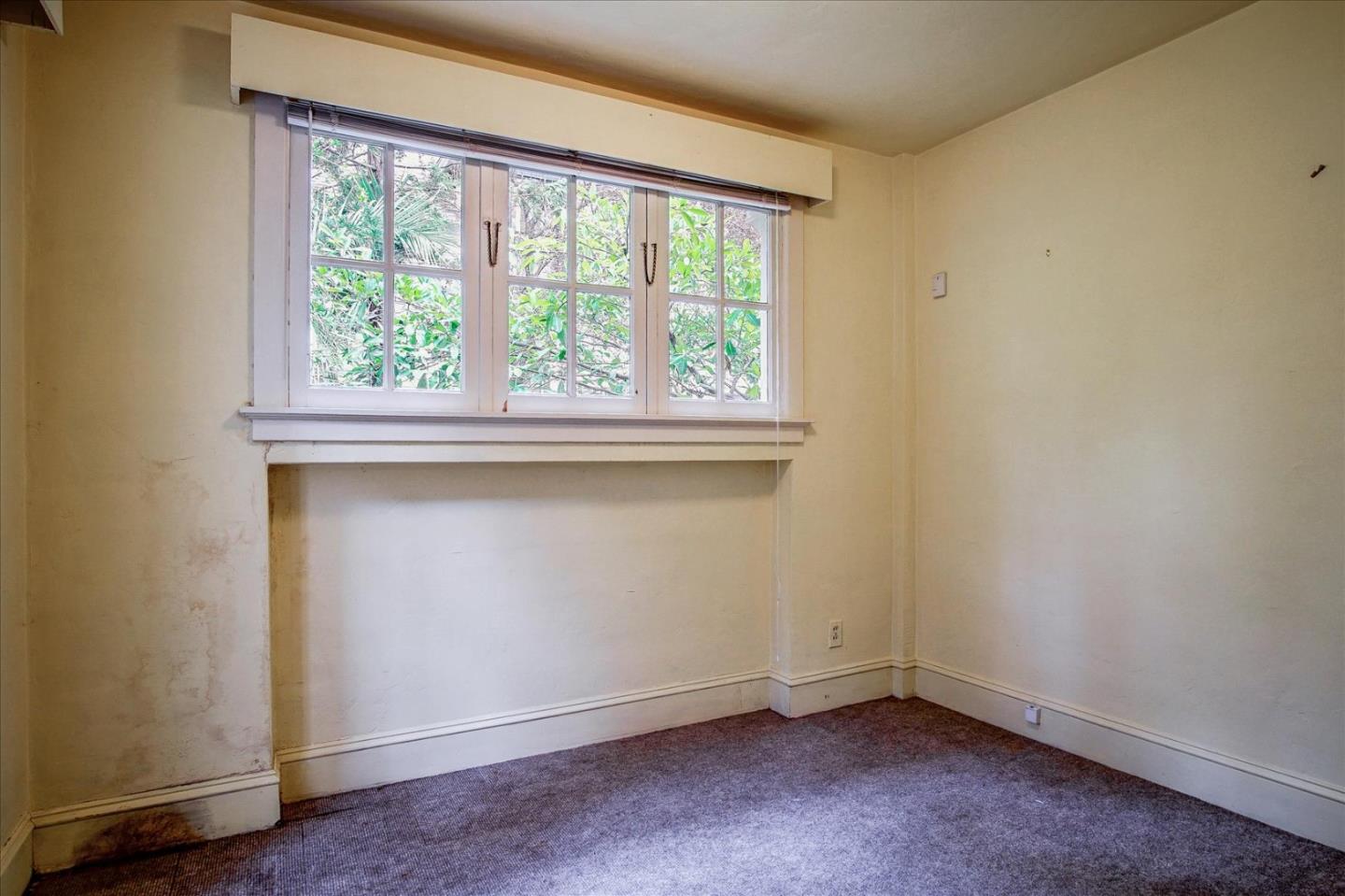 286 5th Street Gilroy, CA 95020 - Photo 20 of 47 an empty room with a window