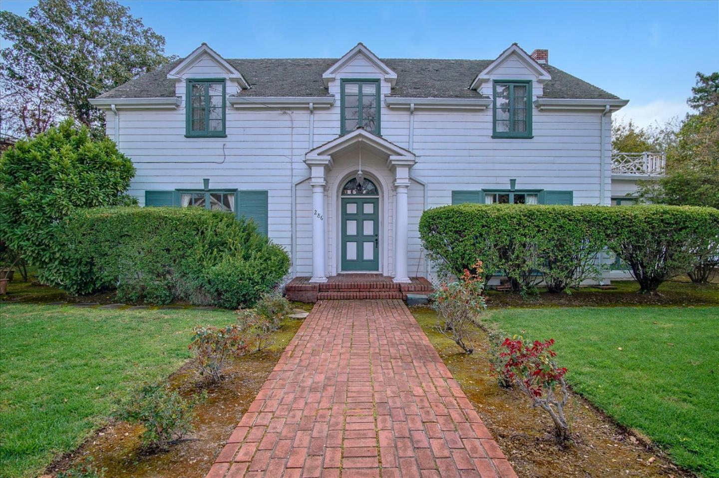 286 5th Street Gilroy, CA 95020 - Photo 4 of 47 a front view of a house with garden
