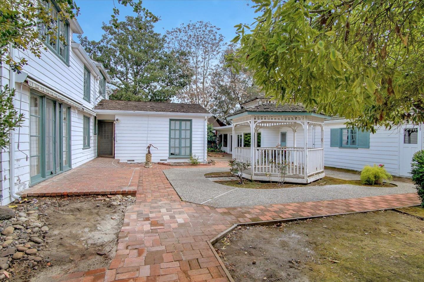 286 5th Street Gilroy, CA 95020 - Photo 40 of 47 a view of a house with backyard and sitting area