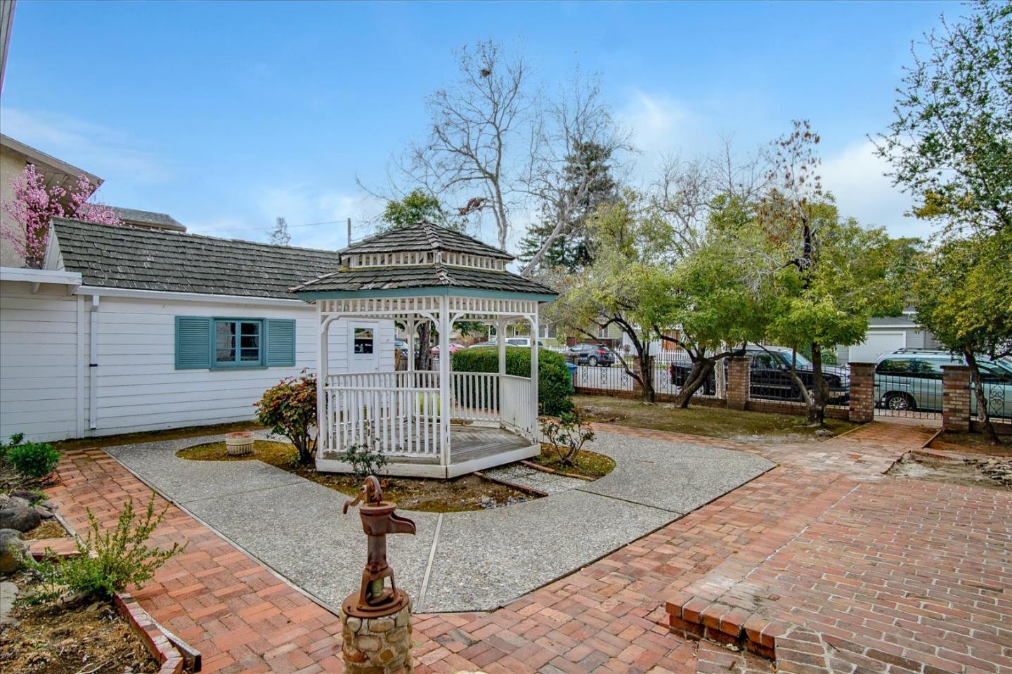 286 5th Street Gilroy, CA 95020 - Photo 41 of 47 a front view of a house with sitting area and garden