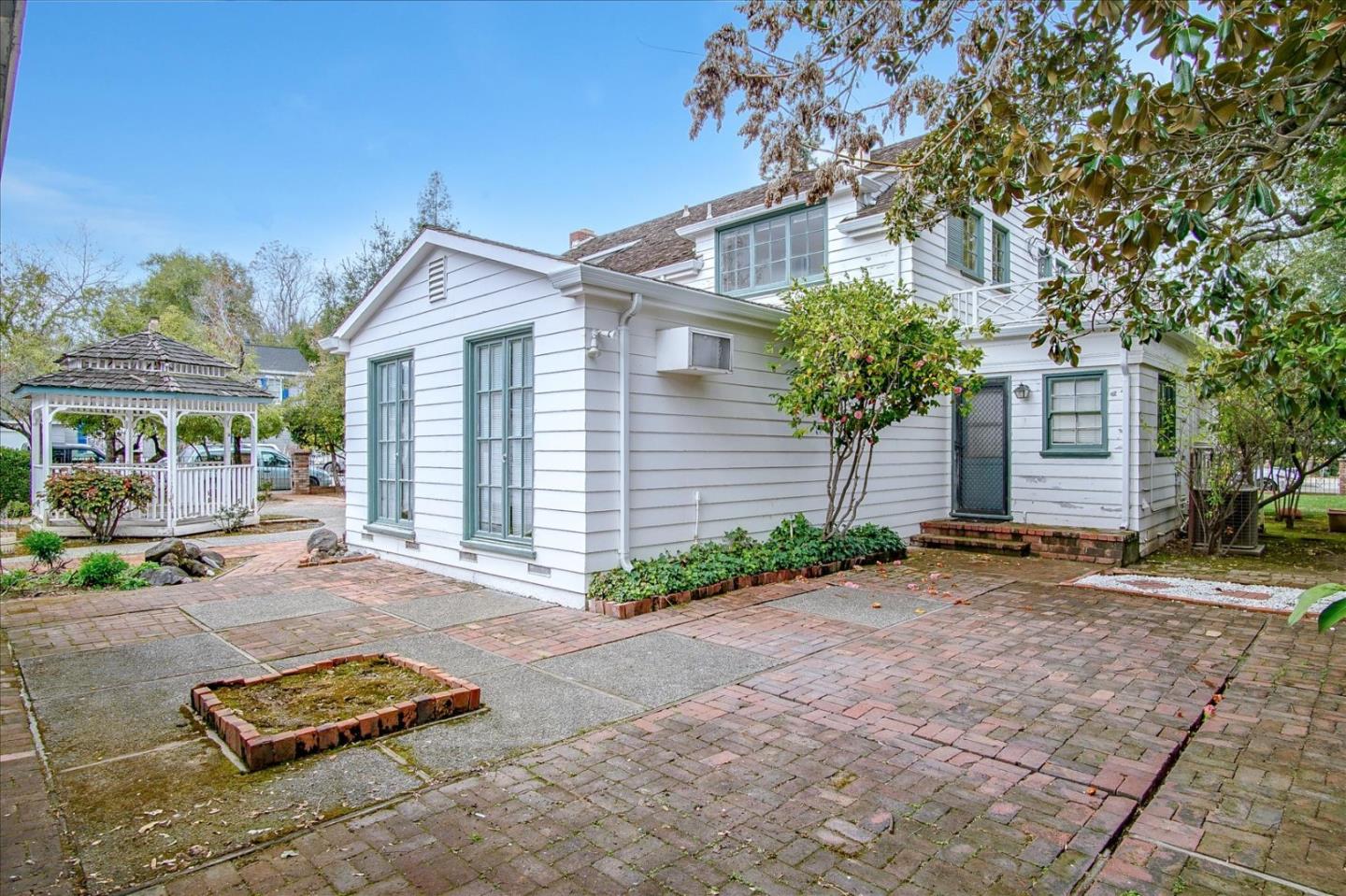 286 5th Street Gilroy, CA 95020 - Photo 44 of 47 a view of a house with a yard and sitting area