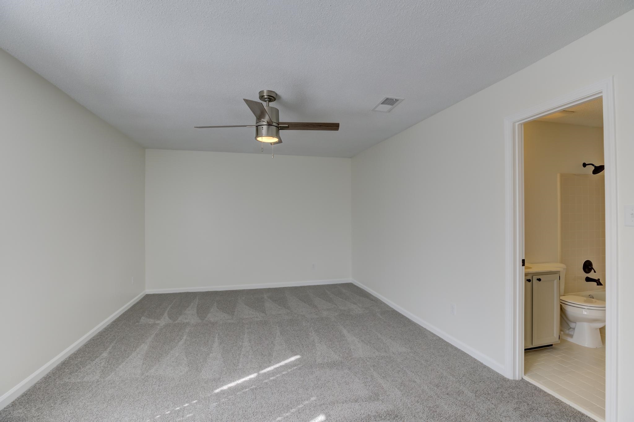 3997 Sawgrass Drive Memphis, TN 38125 - Photo 12 of 24 a view of a room with rack on the wall