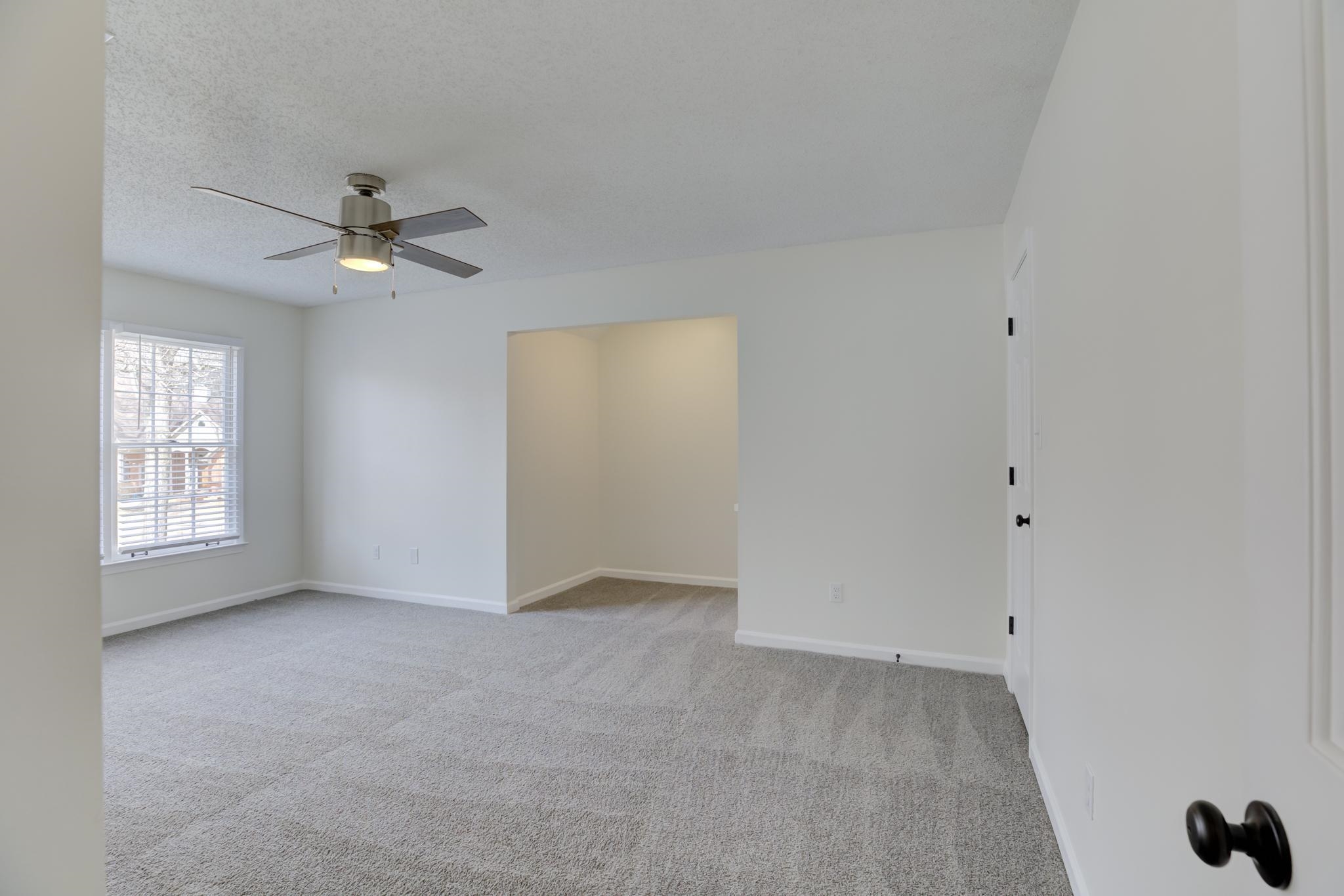 3997 Sawgrass Drive Memphis, TN 38125 - Photo 15 of 24 a view of an empty room with a window
