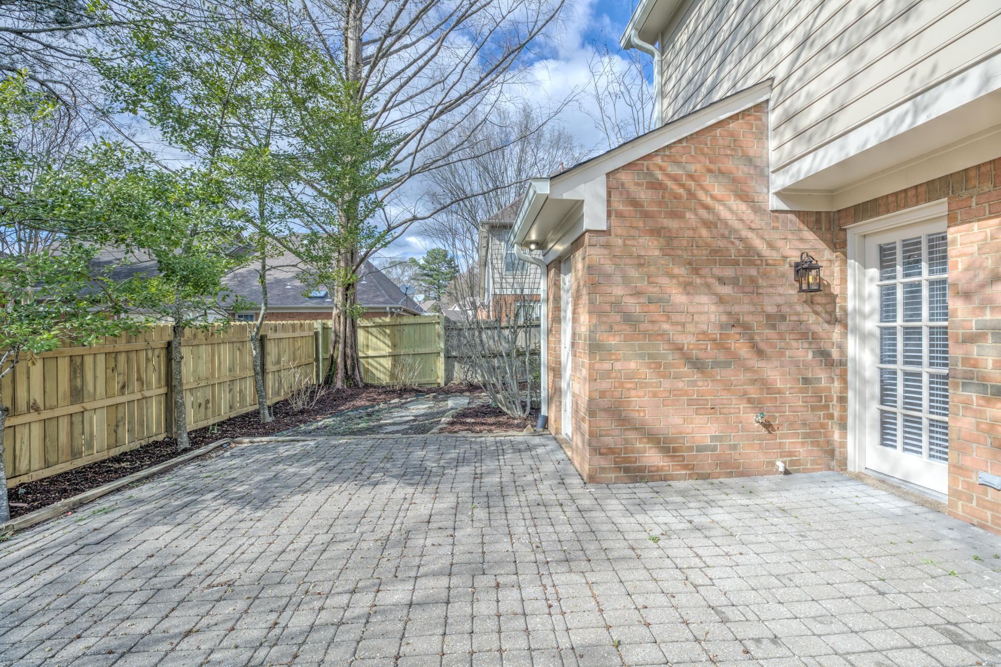 3997 Sawgrass Drive Memphis, TN 38125 - Photo 20 of 24 a view of a backyard of the house