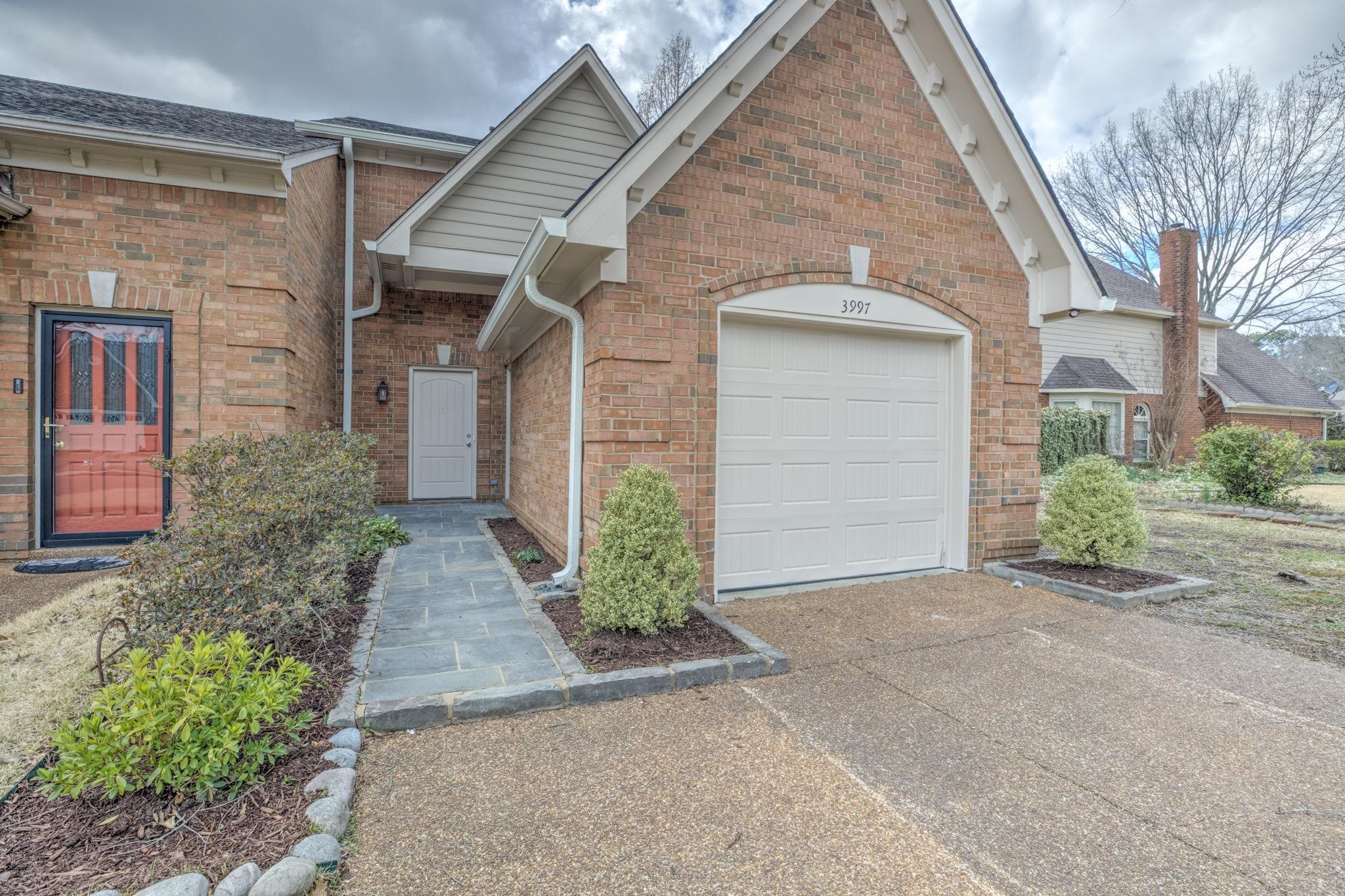 3997 Sawgrass Drive Memphis, TN 38125 - Photo 2 of 24 front view of a house