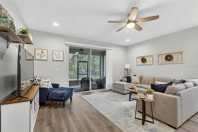 a living room with furniture and a window